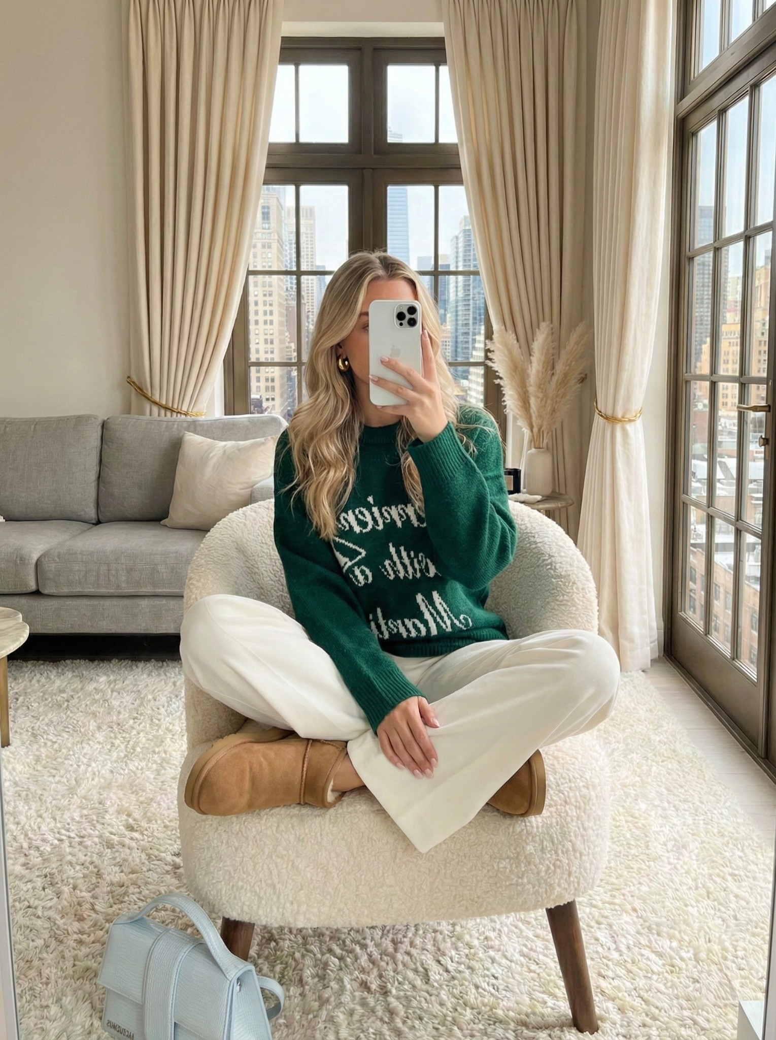 Green graphic sweater and mini boots outfit ☕️🌲

The ultimate cozy vibes for winter lounging. Pairing this forest green statement sweater with soft white wide-leg trousers for a relaxed fit. Finished with classic tan mini boots for the perfect stay-at-home look.

Style Details:
• Green crewneck sweater with white lettering
• White wide-leg trousers (or lounge pants)
• Tan suede mini boots
• Mini blue top handle bag
• Gold hoop earrings

Recreate this cozy off-duty look with the similar styles linked below!

What is your favorite way to spend a cozy winter Sunday? 👇

#LTKSeasonal #LTKhome #LTKshoebrush


#LTKgrwm #LTKootd #LTKHoliday