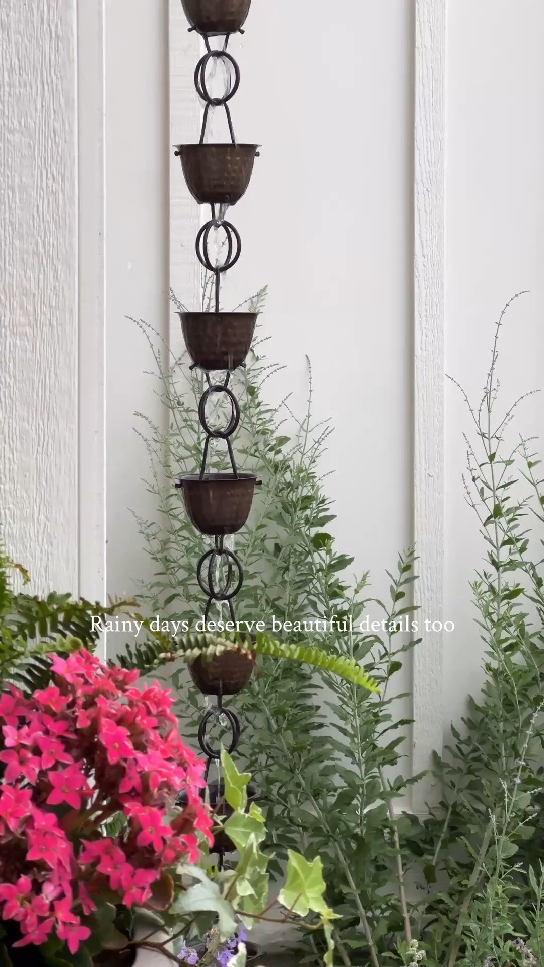 This is a copper rain chain and I have linked the exact one we have. We have had ours for 3 years, and it now has an aged look to it. It did not take long to get that look though! Probably one season.

#LTKSeasonal #LTKHome