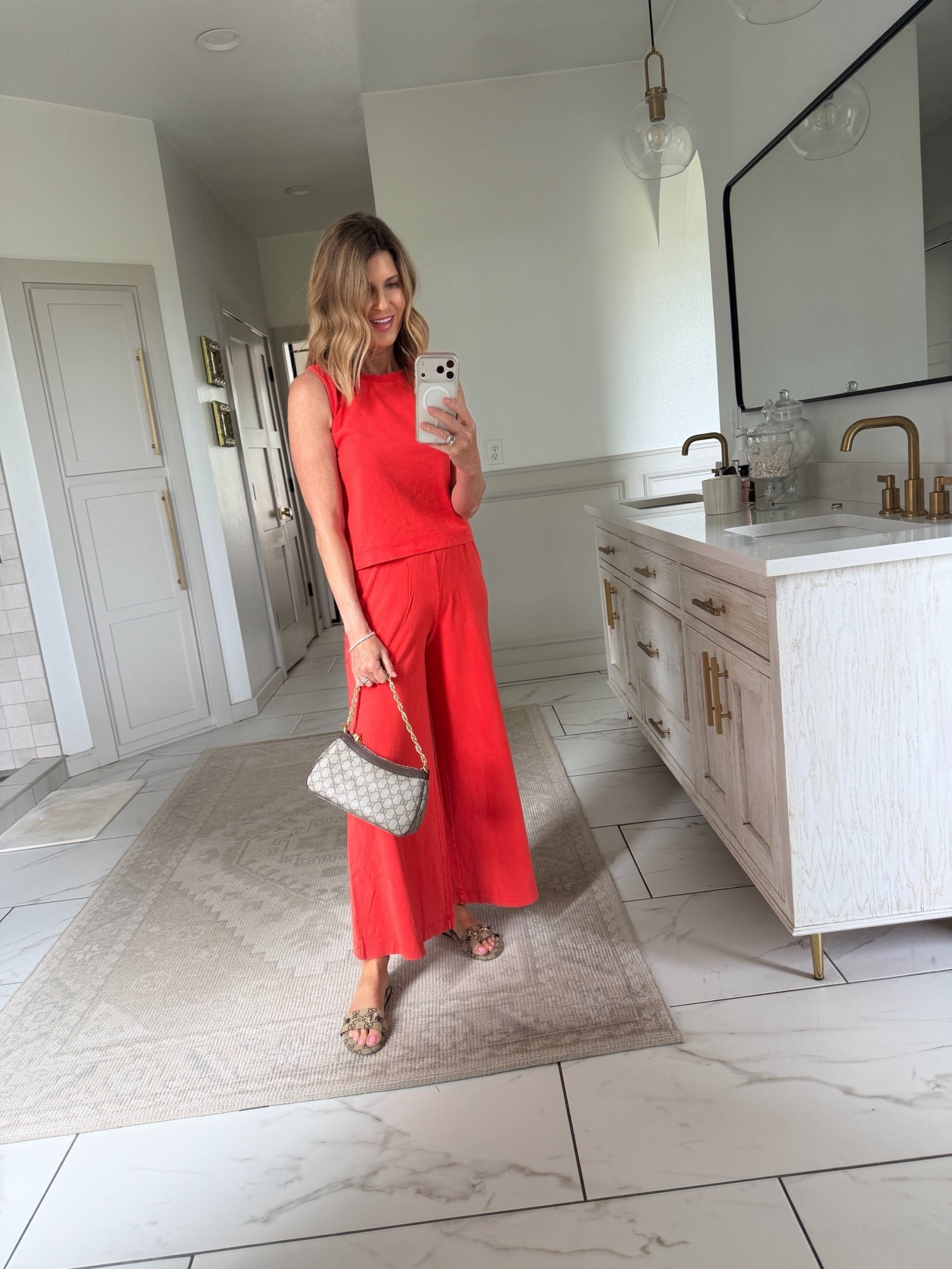 The color is lychee and earring a small top and small jersey pant

#LTKOver40