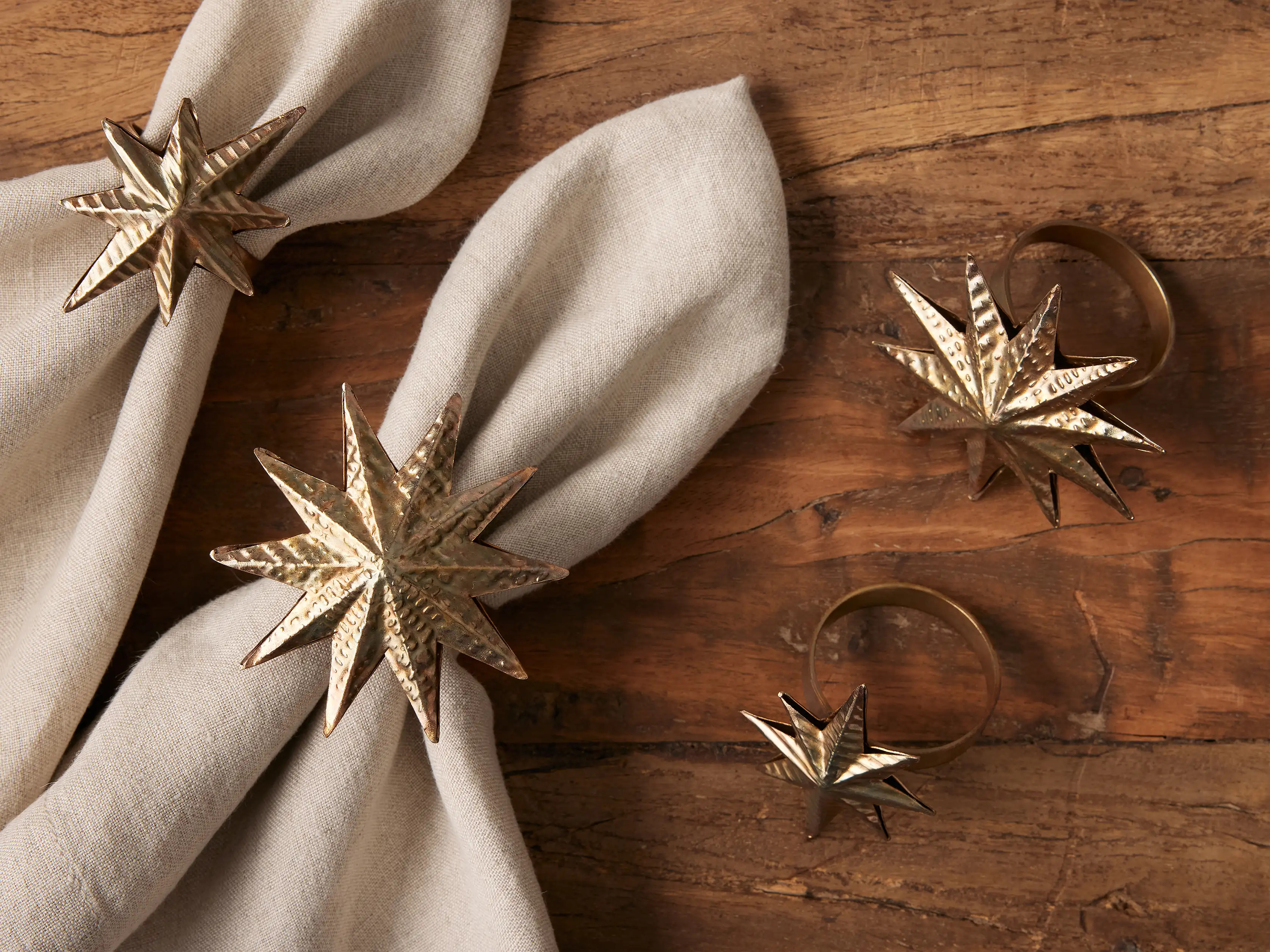 Embossed Star Napkin Ring in Brass (Set of 4) | Arhaus