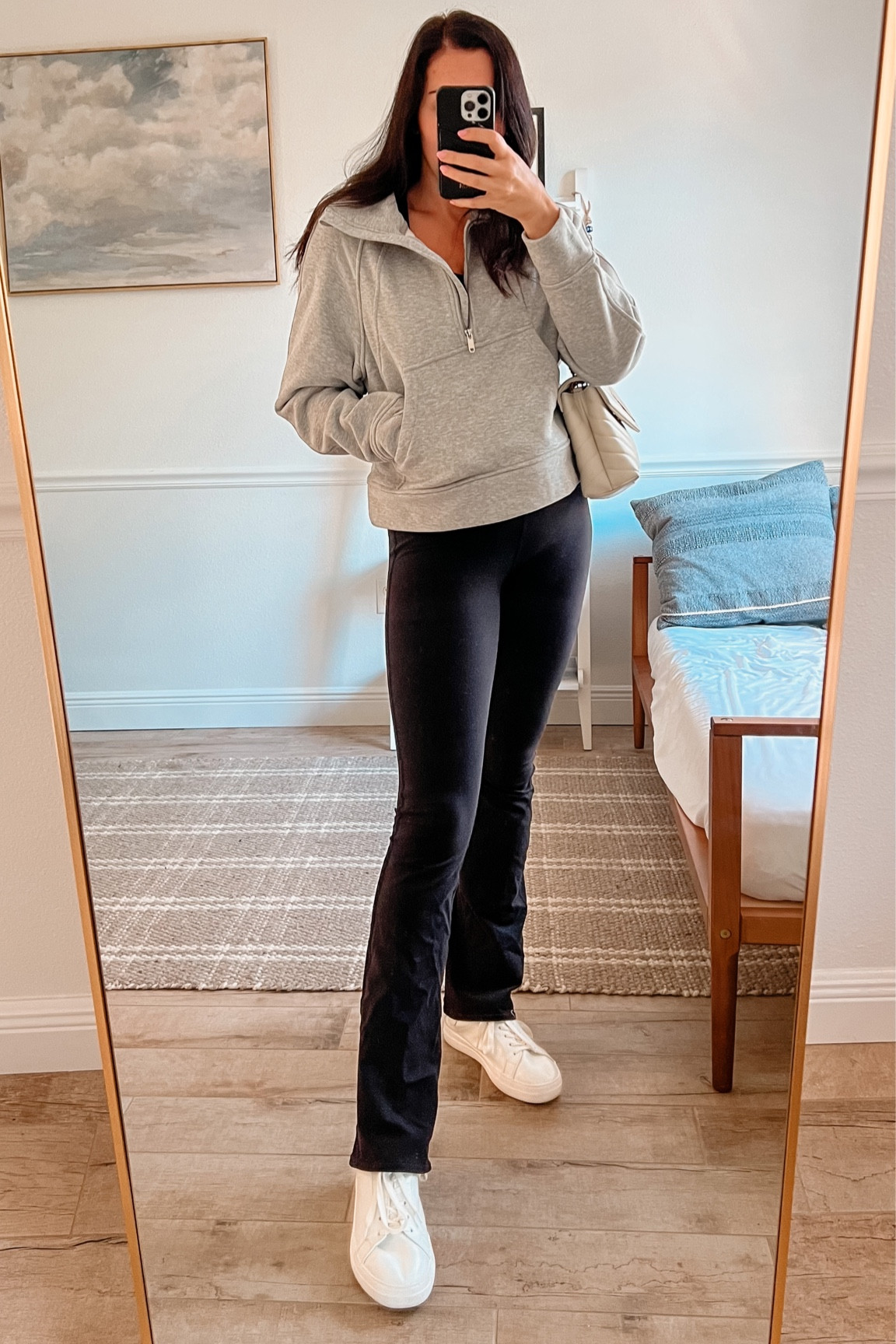 Casual and cozy outfit with scuba dupe sweatshirt, Alo flare leggings, YSL purse and white lifestyle sneakers 

#LTKSeasonal