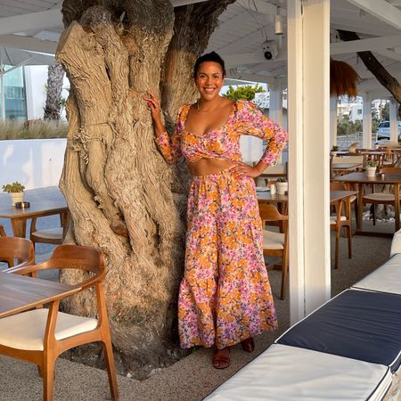 Vacation vibes to the MAX in this Something Navy printed set with wide leg pants and an off the shoulder crop top. 

I’m wearing a large in both pieces, though the pants run big. 

And I rented this set! Use code RTRALIJ for 40% off your first 2 months of rent the runway. 

#LTKSeasonal #LTKtravel #LTKstyletip