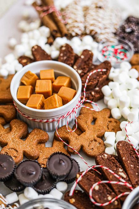 Make a hot chocolate bar for Christmas morning or a movie night. Hot cocoa, warm mugs, cookies, marshmallows, and more on a cheeseboard or cutting board! 

#LTKSeasonal #LTKGiftGuide #LTKHoliday
