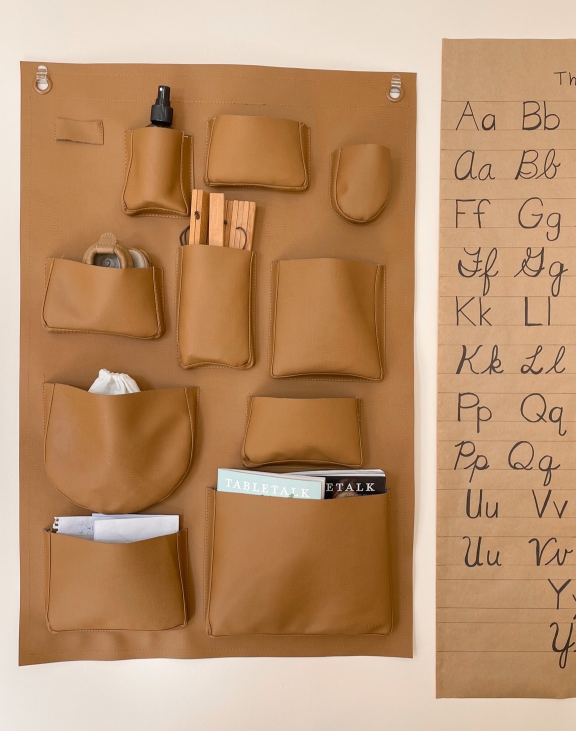 our wall tidy hangs in our dining/school area beside our hand made ABC chart. holds so many doo-dads and extras! 🤎

#LTKhome #LTKunder100 #LTKSeasonal