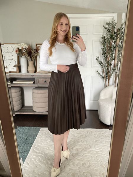 Chic Walmart outfit idea with a white long sleeve top and a chocolate brown faux leather skirt (size M) 

#LTKmidsize #LTKfindsunder50 #LTKSeasonal
