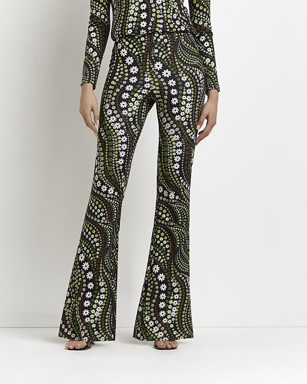 Green floral print flared trousers | River Island (UK & IE)