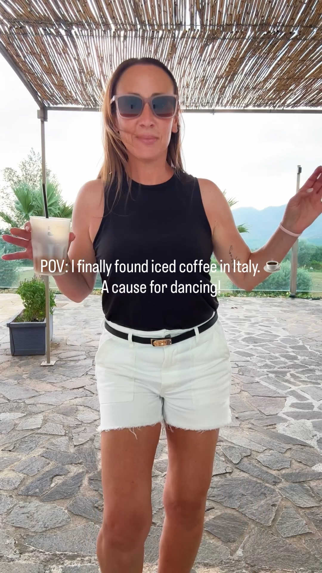Finding an iced coffee in Italy felt like winning the lottery 😂☕. Once I had my coffee, this easy summer outfit was all I needed for a day exploring. Sharing all the details because these white shorts, comfy sandals, and simple black tank are pieces I’ll wear on repeat all summer

#LTKootd #LTKgrwm #LTKmomlife