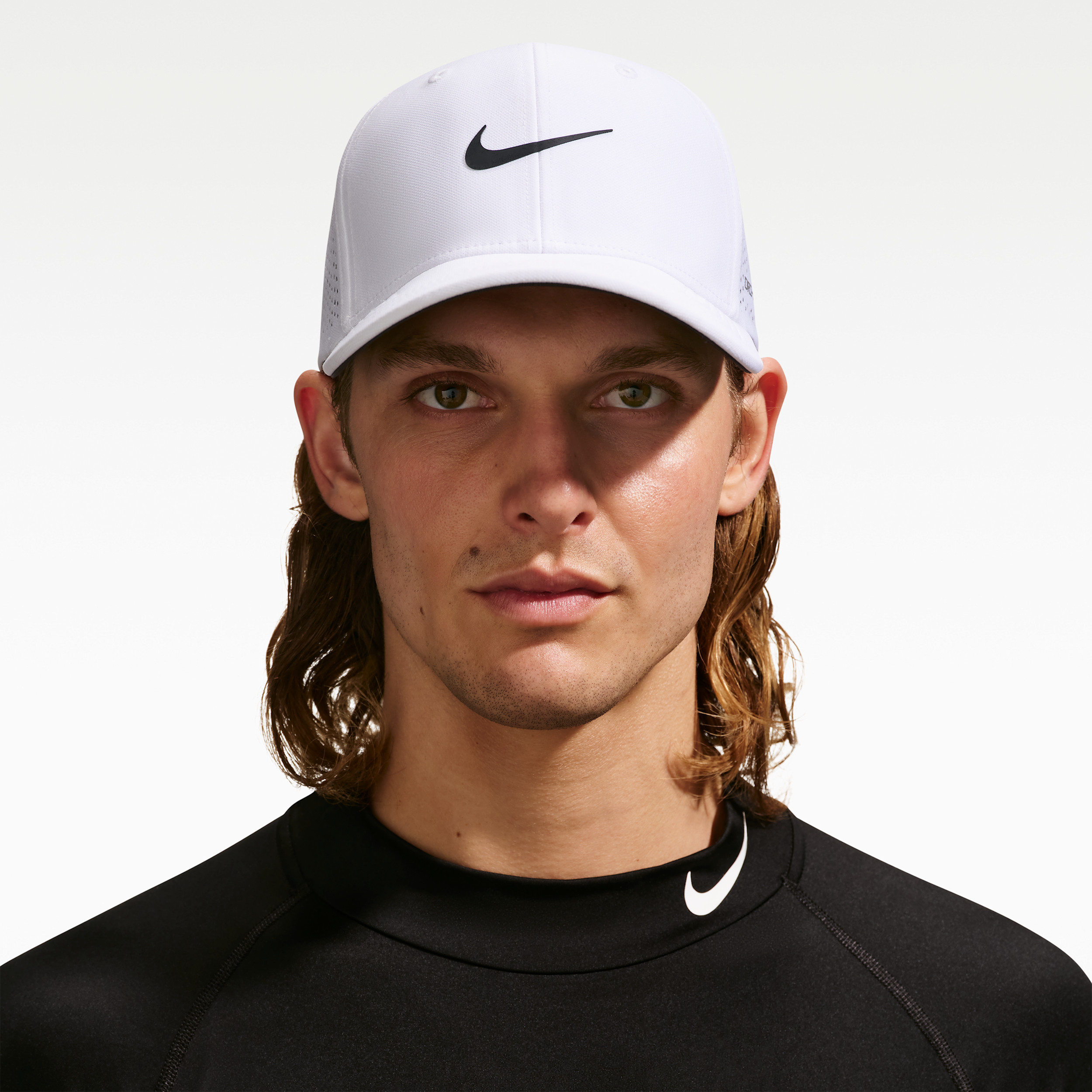 Nike Unisex Rise Dri-FIT ADV SwooshFlex Structured Golf Cap in White | II1736-100 | Nike (US)