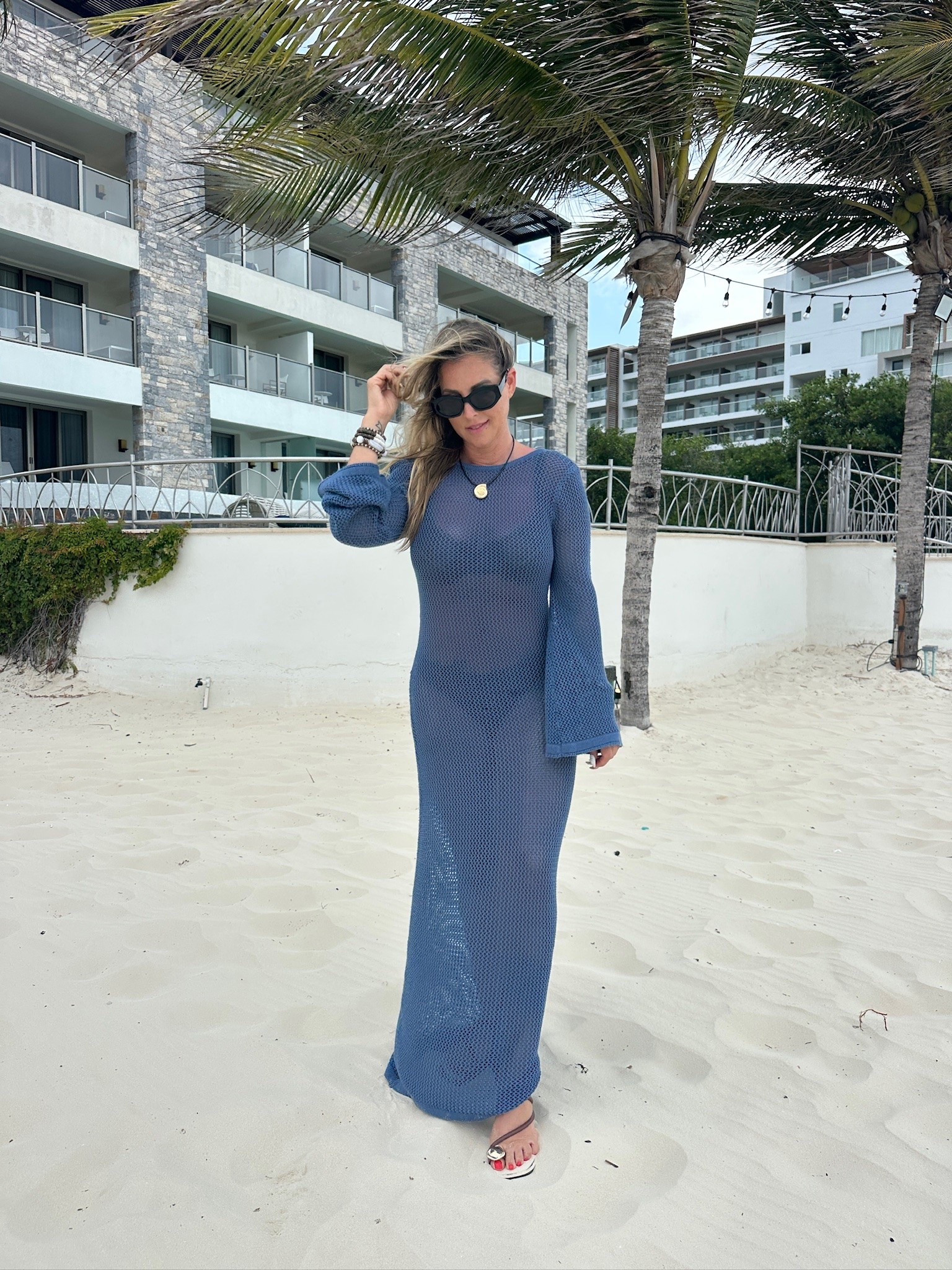 This blue coverup crochet dress is amazing! | love the color so much and the fabric is amazing. lam wearing it with my brown bikini from Vetchy (love all of their sizing options!) and my new sandals from Amazon! I added my gold shell necklace, beaded bracelets and my SOJOS sunglasses (you can use code NICHOLES) for a discount) All items linked⬆️

#Itkcreator #Itkfinds
#Itkwatchnow #amazon #amazonfinds #coverup #crochet #sandals
#summer #summerfinds #summeroutfits #sunglasses #sojos

#LTKgrwm #LTKootd #LTKSwim