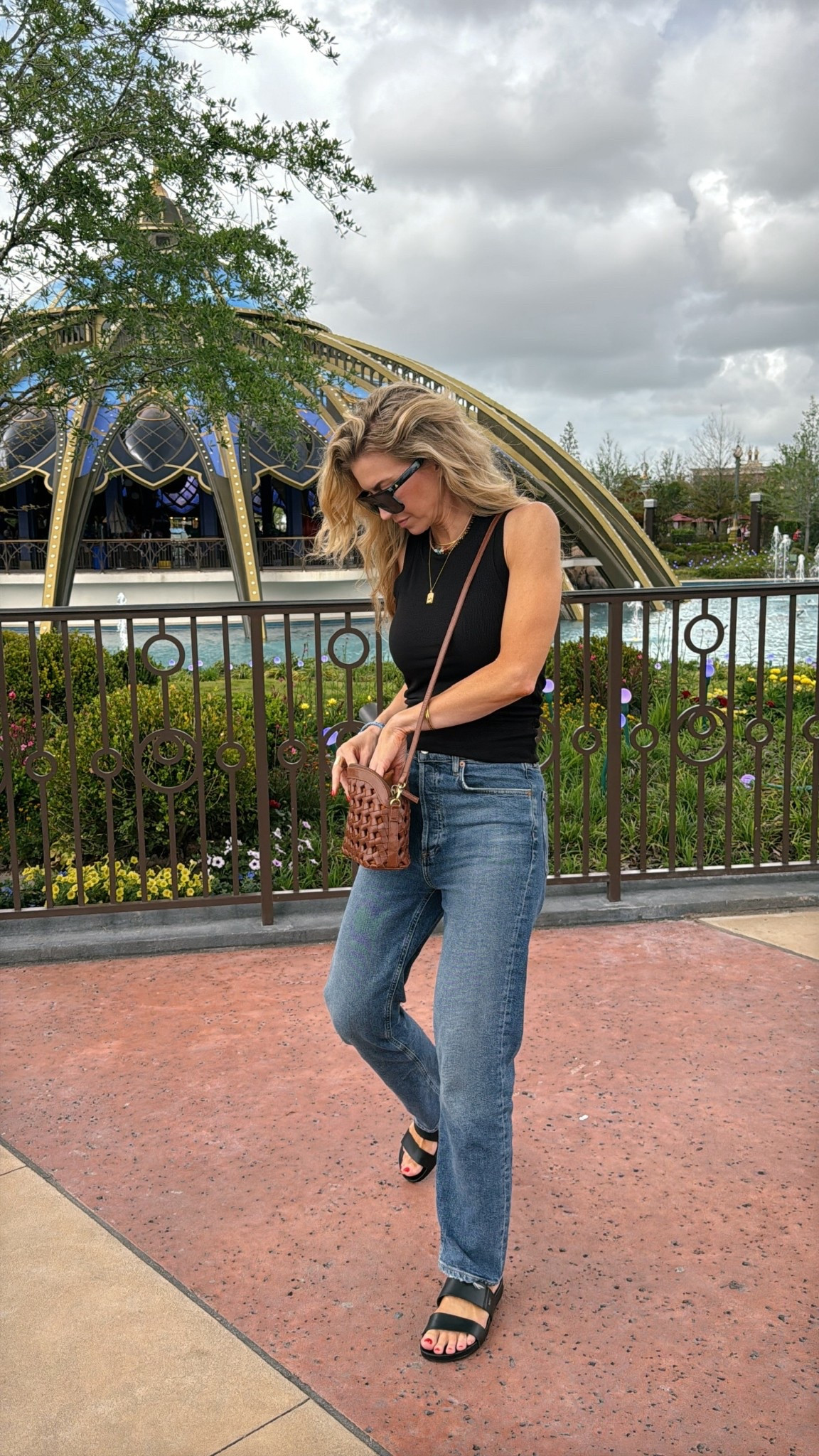 Amusement park OOTD! 
Tank: runs TTS, wearing size small
Jeans: run TTS, wearing size 25
Sandals: run TTS, so comfortable! 

#LTKSeasonal #LTKdayinmylife #LTKootd