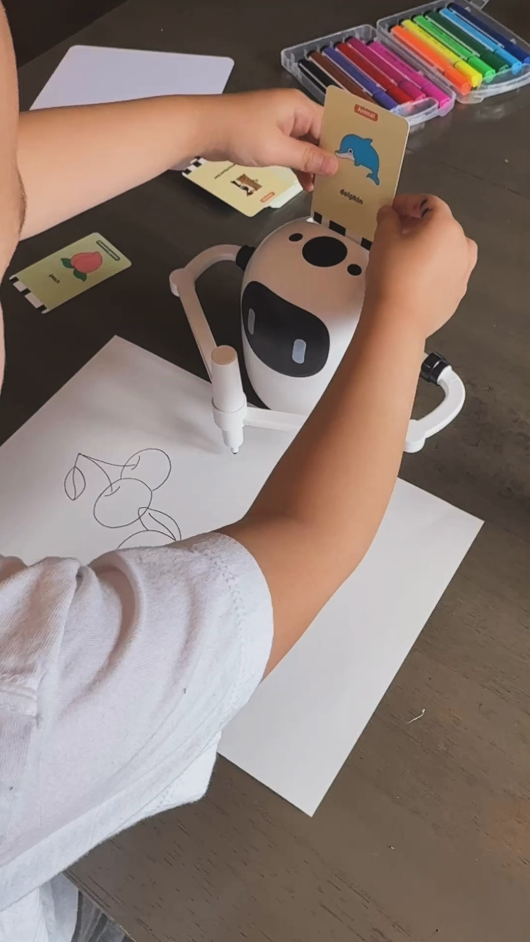 Drawing robot. Comes with different cards you insert and it draws it. It goes slow enough if you want to follow along with it and learn to draw. Or you can color the pictures in. Cute idea that definitely keeps the kids busy and in awe.

#LTKKids #LTKdayinmylife #LTKmomlife