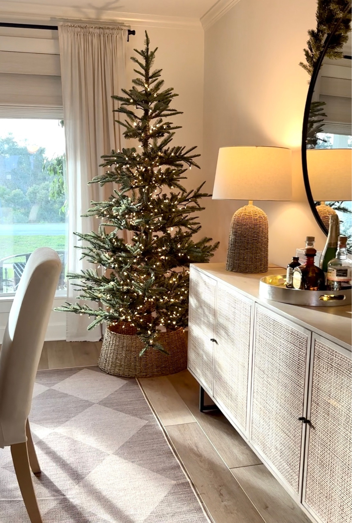 My favorite Christmas tree!!
Super easy and fuss-free
Washable jute rug 
Console table 
Rattan console 
Dining room decor 
Christmas lights 


#LTKhome #LTKHoliday