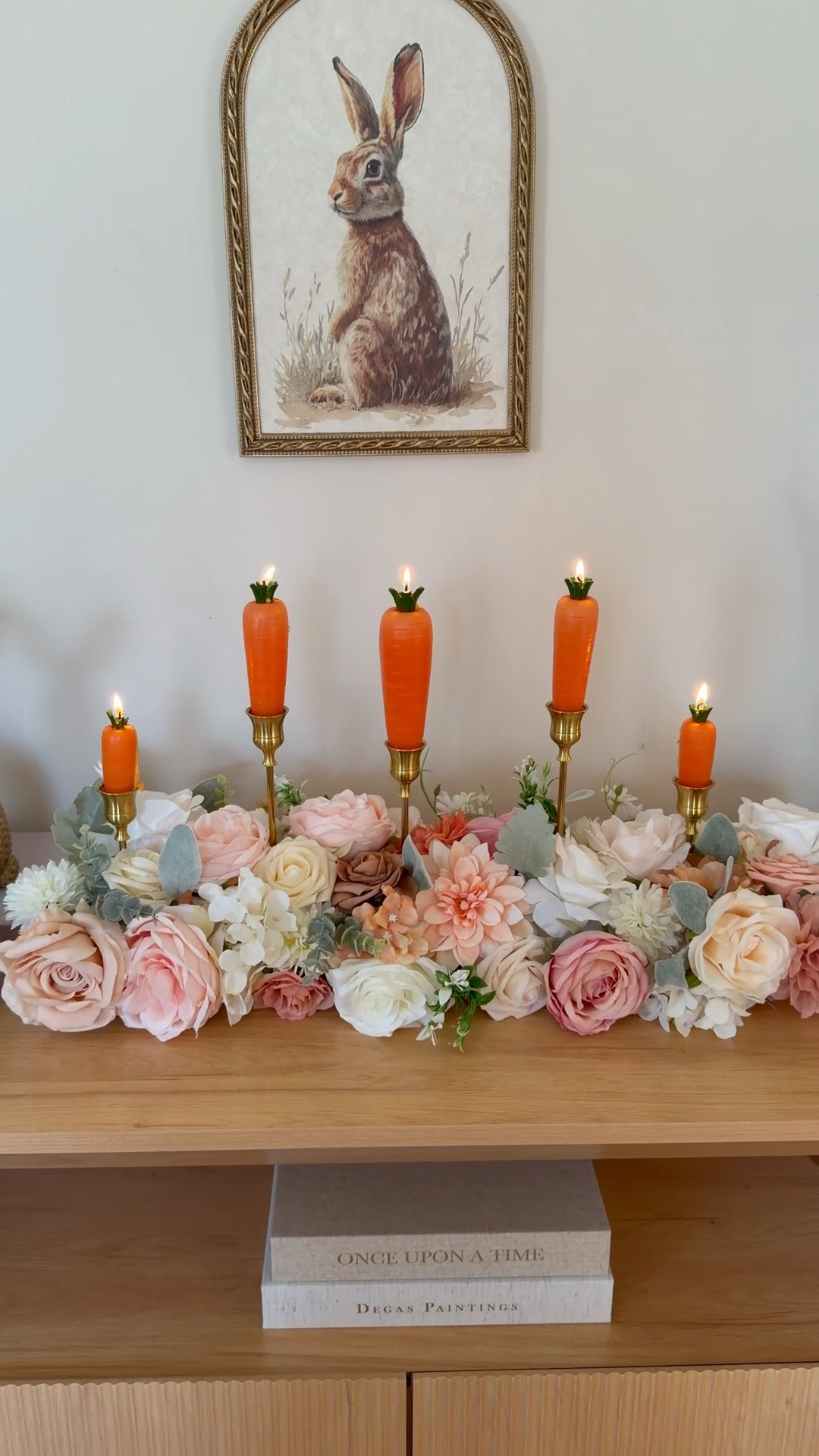 These adorable carrot candles inspired this floral Easter centerpiece, which looks so beautiful but is so simple! All you need is a pool noodle, cut in half and attached around the candleholders with zip ties and then the faux flowers of your choosing! These sets from @amazon are my favorites! 

#LTKHome #LTKSeasonal