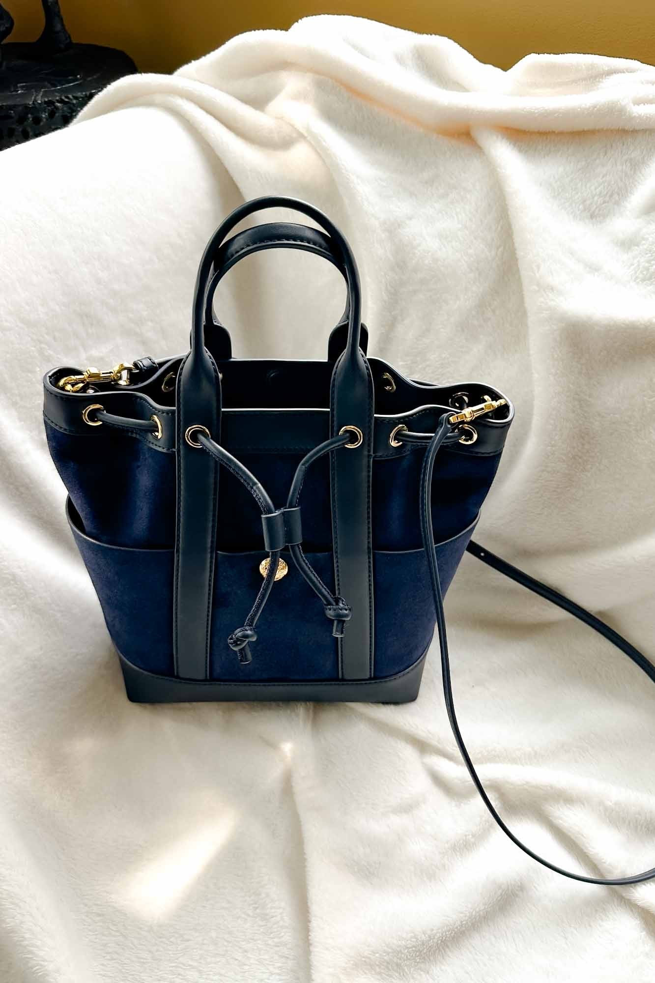 This gorgeous Veronica Beard handbag is now on sale in olive. Suede is trending for fall and this is an easy way to stay on trend no matter what outfit your are wearing.  💙 Nipa 

#suedehandbag #handbag #bucketbag

#LTKOver40 #LTKSaleAlert #LTKSeasonal