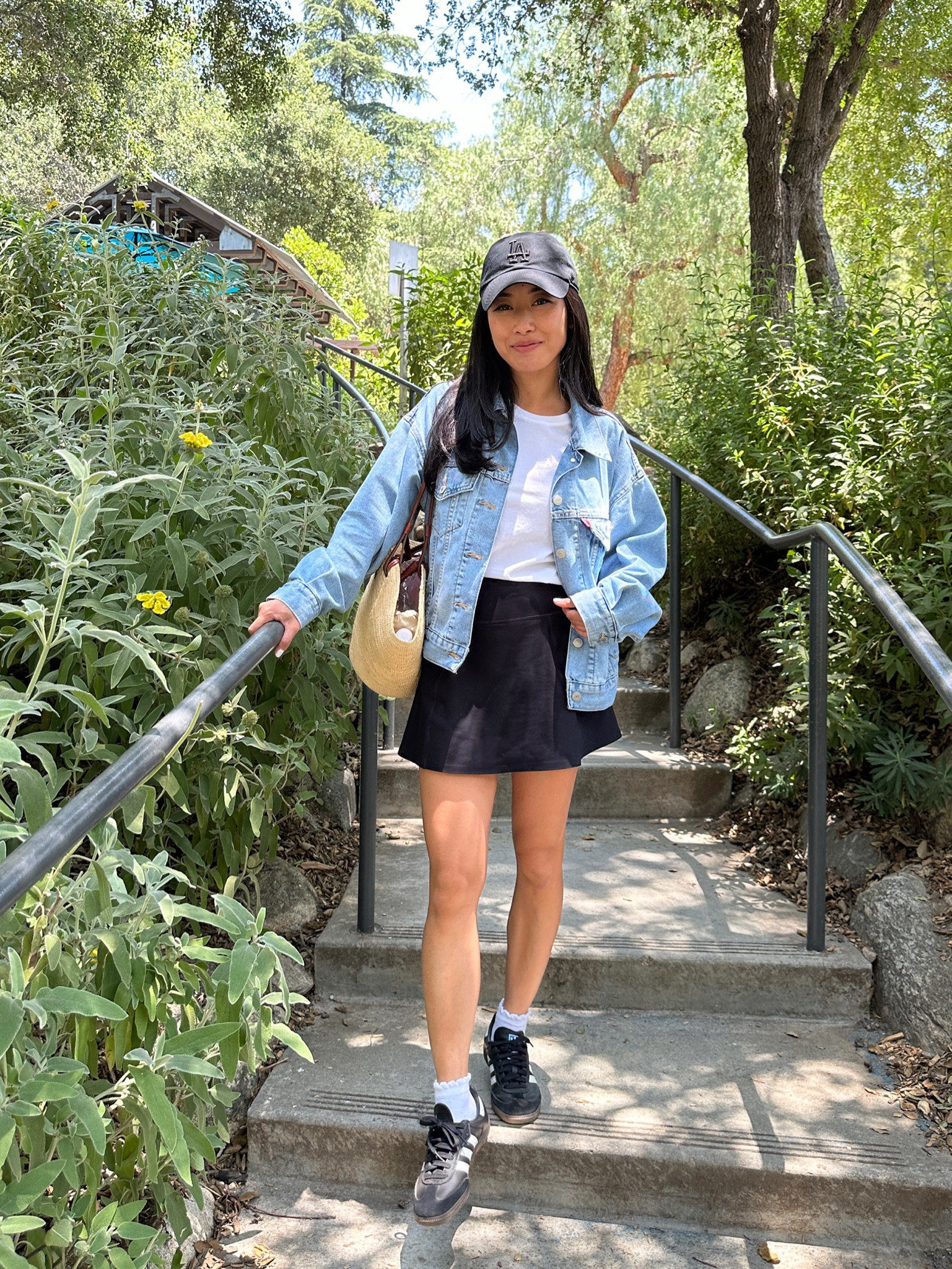 Casual mom on the go / Disney or theme park friendly / airport travel outfit

• Levi's 90's trucker jacket xxs - A relaxed oversized fit, very on trend and effortless feeling. the material has tencel in the blend and drapes and is soft for denim vs stiff. Xxs appears to be sold out - I also tried Xs and it wasn’t a huge difference 

I also linked the Nordstorm sale version but note that one has a more non stretch rigid denim vs the Levi’s.com jacket which has tencel for softness!

• Everlane white tee Xs. My staple cotton tees! I go a size up for a casual fit . 

• Abercrombie active wear skort xs, (with built in shorts and pocket)

Mind is from last year but I linked their current version! I tried it on recently and it was nearly identical. My usual size xxs fits but I size up to Xs so it’s  little less fitted

• 47 brand black baseball hat

• Adidas sambas men's 4 = women's 5/5.5. Worn with kids socks from target which helps prevent the tongue from rubbing 

• Sezane justine tote 

#petite friendly mom outfits 

#LTKtravel #LTKfindsunder100 #LTKfamily