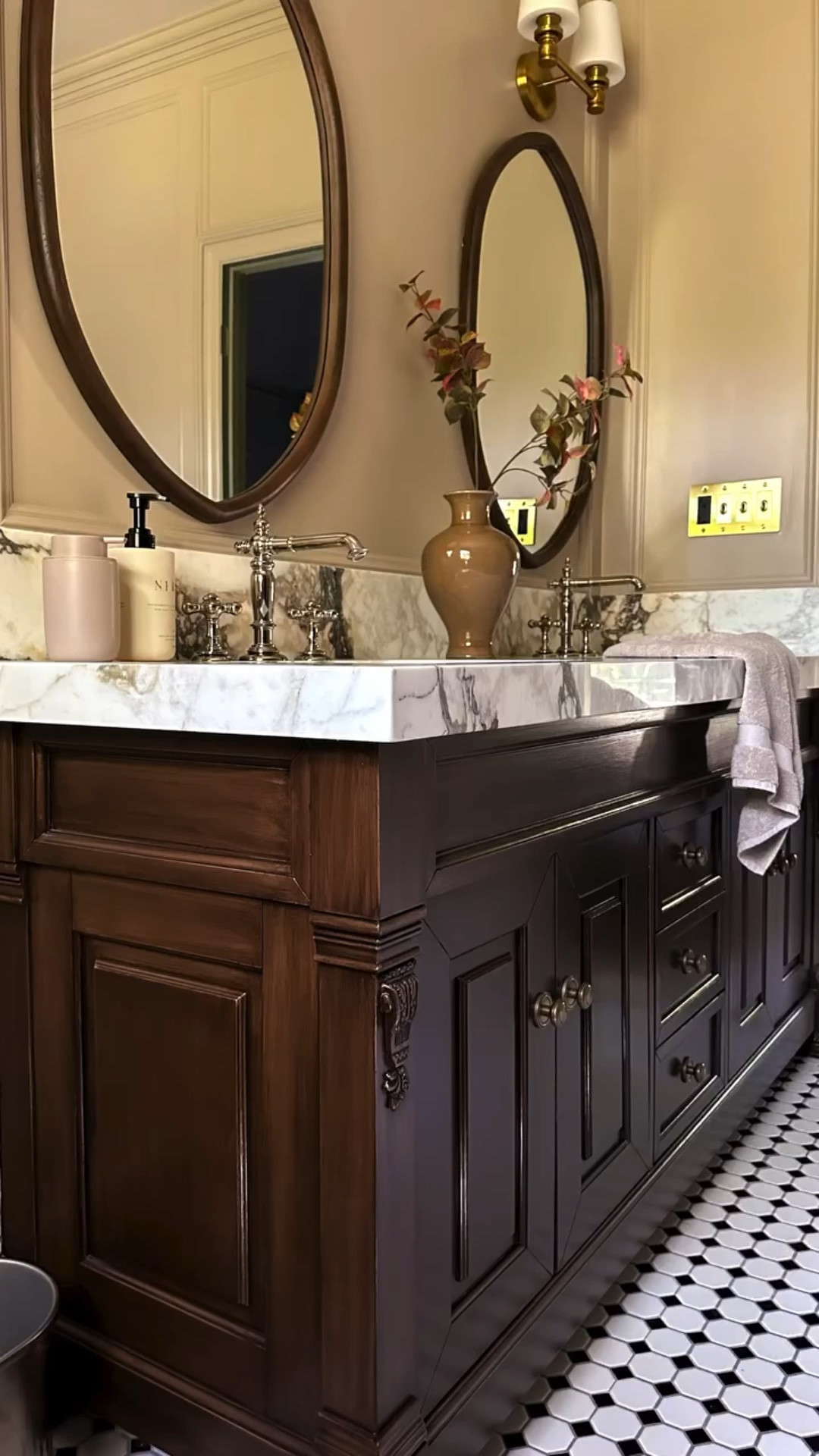 The best part about this DIY bathroom vanity flip is there was no stripping or sanding required. Do I have your attention now? 

Were you here for this one? During the primary bathroom renovation, I completely transformed my black bathroom vanity into a rich walnut finish for just $105 🙌 

The end result looks like a whole new piece! This is such an easy way to update a builder-grade vanity or thrifted furniture without spending thousands on a replacement.

A full tutorial is live on my website if that’s helpful! 


#bathroommakeover #vanitymakeover #diyhomeprojects #homeimprovement #DIY

#LTKHome #LTKFindsUnder50 #LTKFindsUnder100