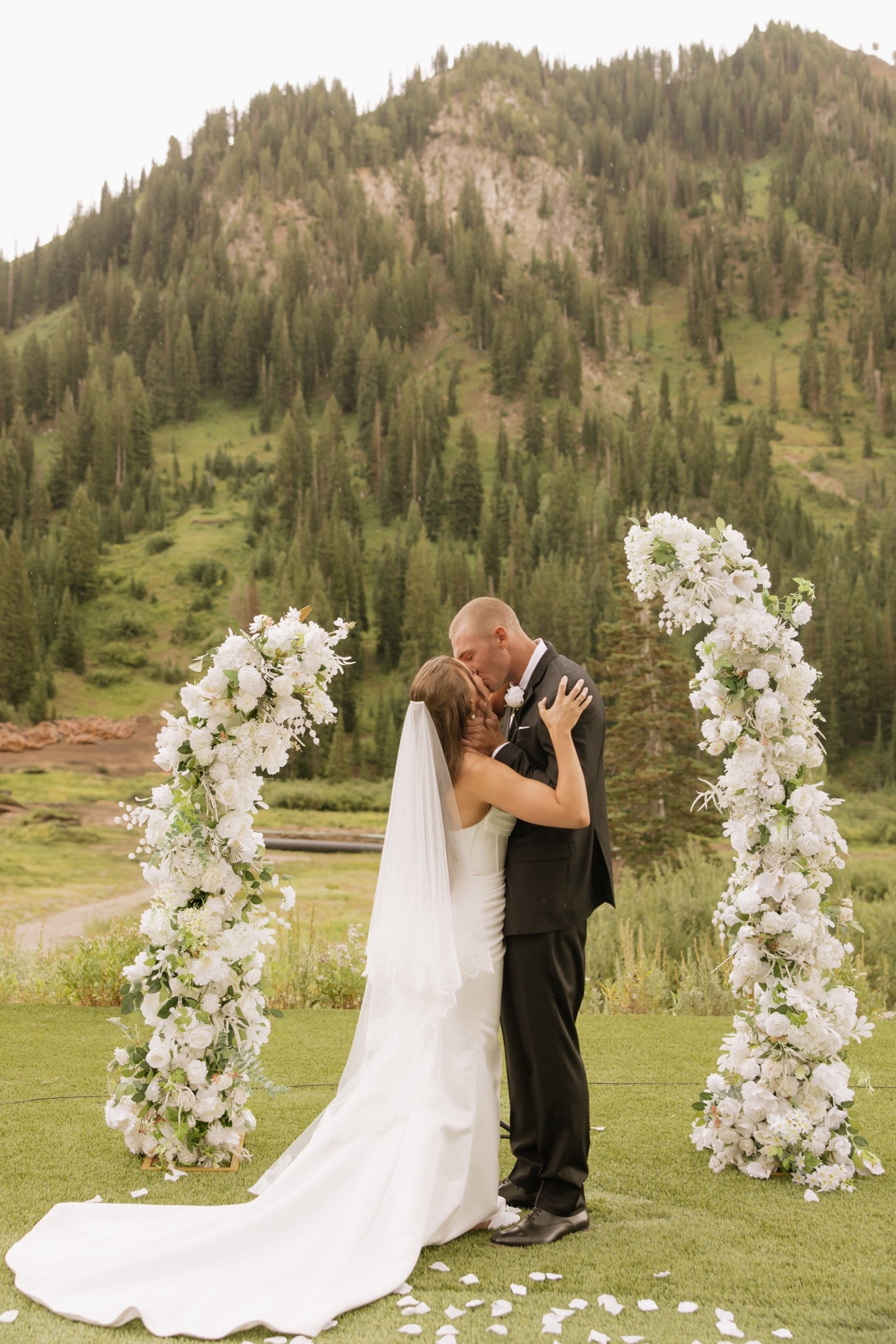 White floral wedding arch, classic mountain weddingg

#LTKWedding
