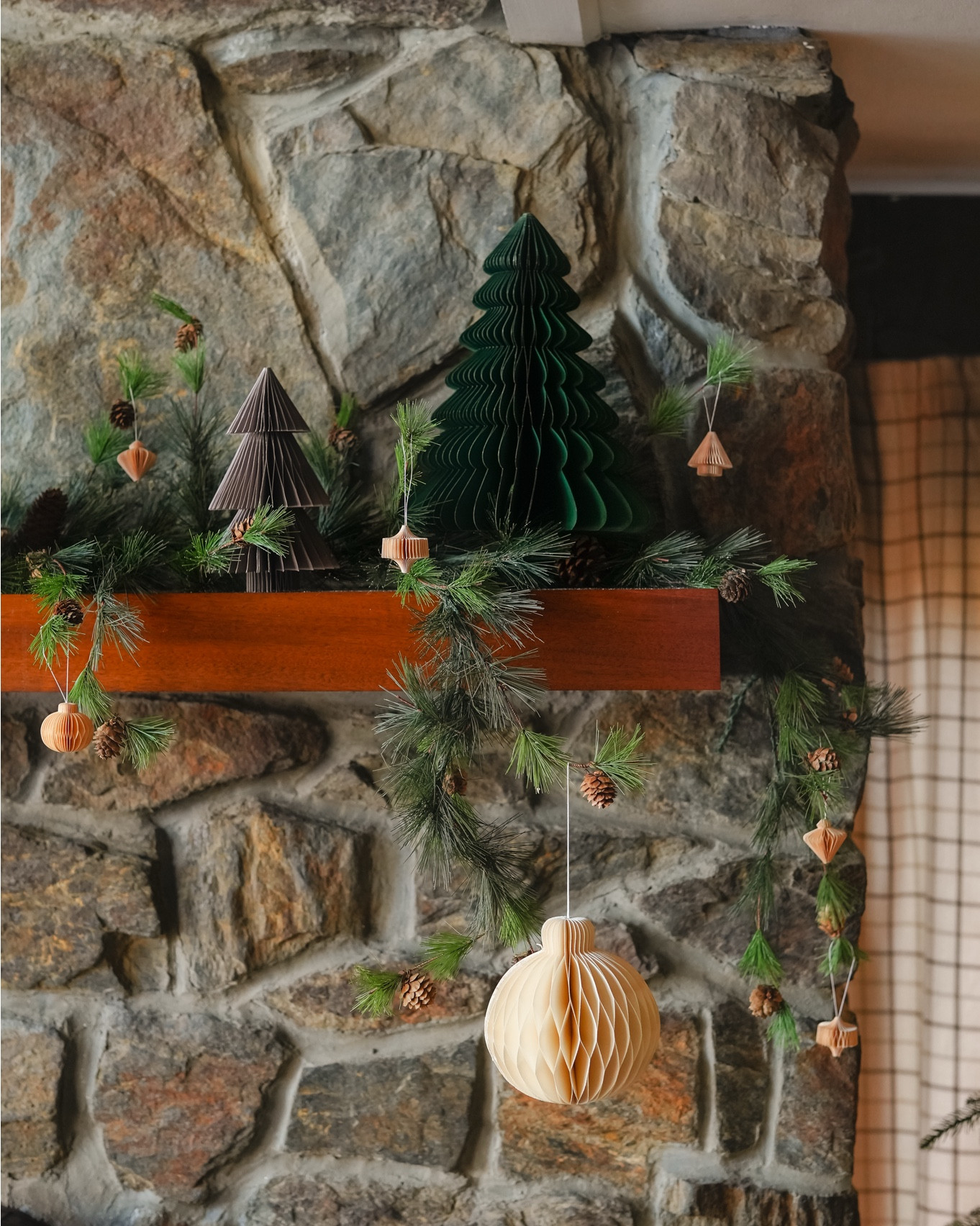 Make it a paper Christmas. We fell in love with this simple pine garland and paper ornaments. They are such great quality finds from AllModern.

#LTKHome #LTKSeasonal