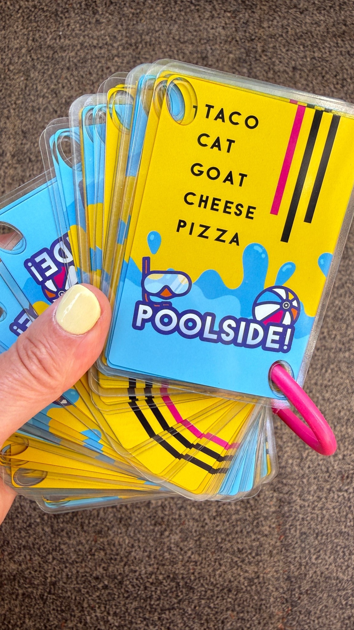 Taco cat goat cheese pizza for the beach or the pool these cards are awesome. They are laminated and come with cute summer themed characters on the already popular game. My kids love that we can bring these to the beach or the pool and they can play them near the water and it doesn’t matter if they get wet plus it comes with this handy little clip so you could clip it onto your beach bag. Definitely I must have for summer boredom busters