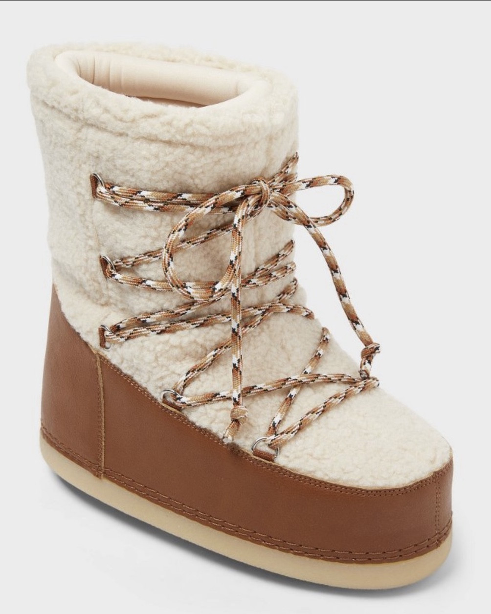 I’ve wanted the Neimans Moon Boots forever!  I even ordered them once, but I could not justify. 

My heart skipped a bit when I saw these look for less at Target!!!  I snagged them on sale, but $65 compared to $650 is a STEAL!!!  

Super comfy and perfect!!!  

*I can’t link the pricey ones because they are sold out.  Seriously get you a pair!!!!  They were $650!!!!

Get you some! 

#LTKGiftGuide #LTKHoliday #LTKSeasonal