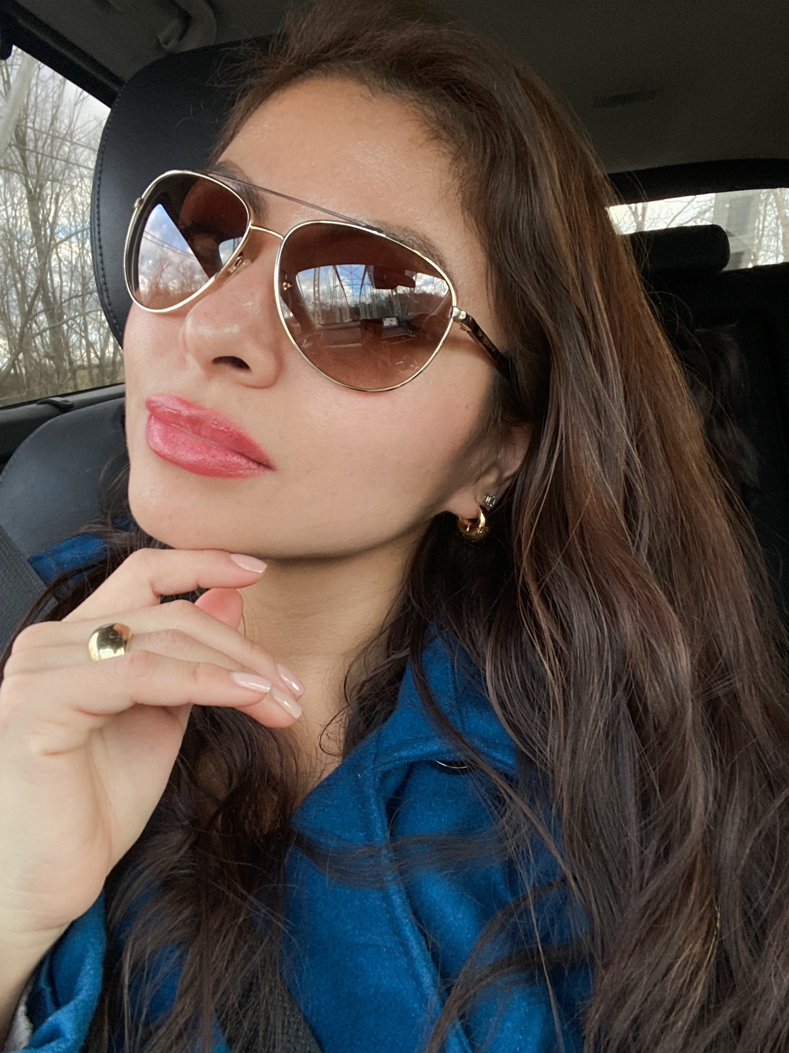 Staying warm in the car in this windy day. What are your plans for this Sunday? 
Wearing this beautiful golden dome ring and puffy earrings.

#LTKbeauty #LTKGiftGuide #LTKfamily