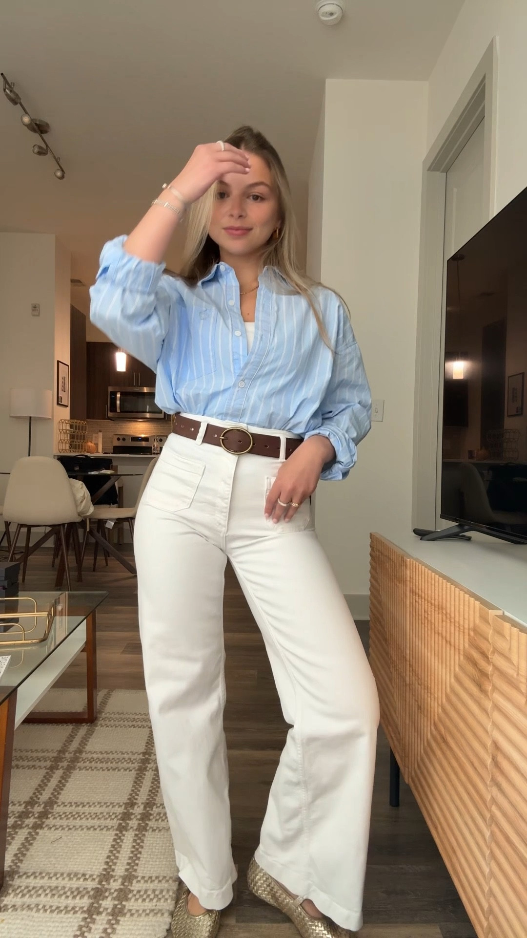 Easy outfit idea for summer: blue striped button-down + white wide-leg jeans. Styled with a brown belt and neutral espadrilles for a polished, casual look. 

#whitedenim #stripedshirt #summeroutfitideas #casualchic #LTKfashion #LTKstyletip

#LTKWorkwear #LTKFindsUnder50