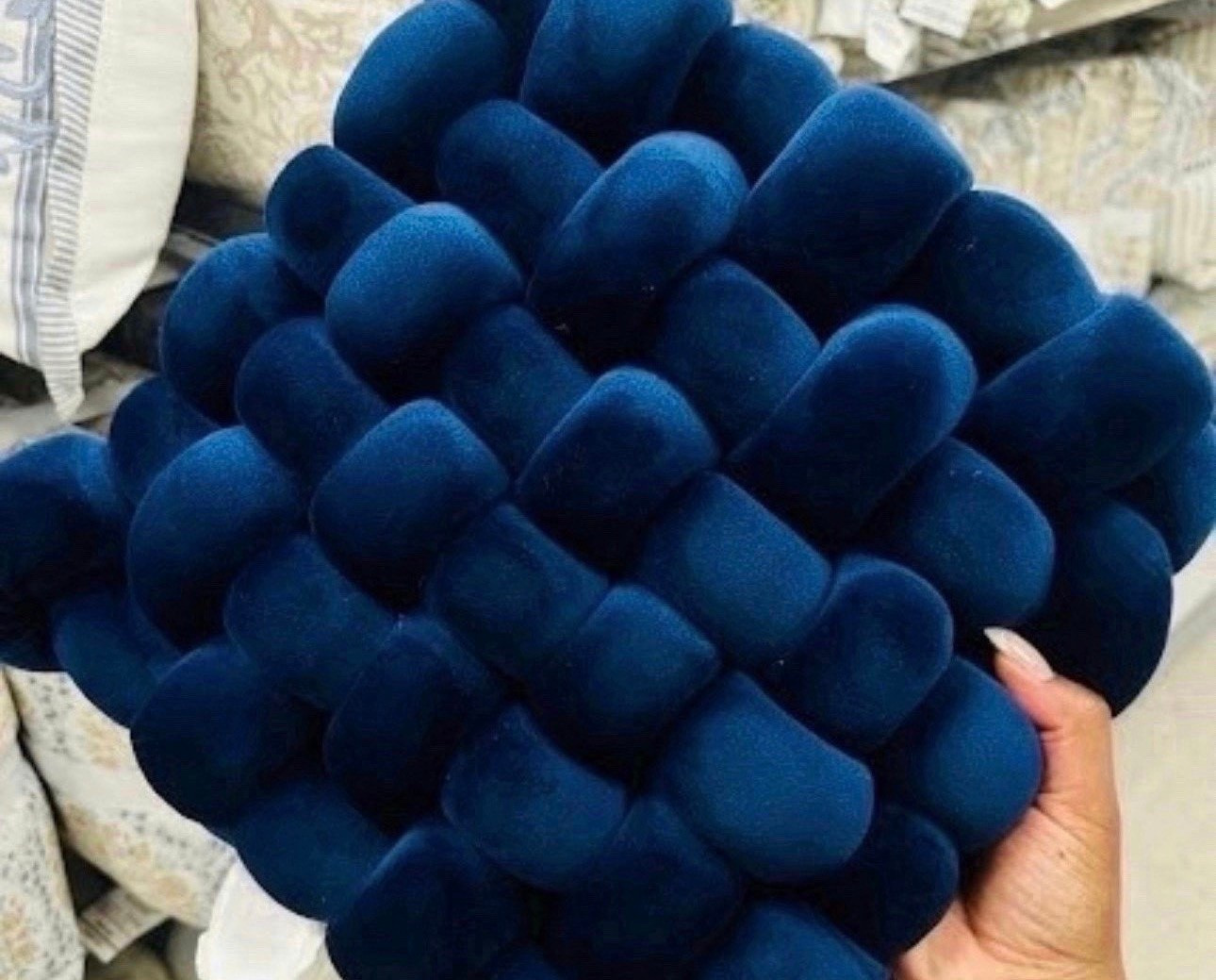 It’s all in the details! 💙 This deep navy woven knot pillow adds the perfect pop of color and texture to any sofa or bed. That velvet finish is incredibly soft and looks so expensive.

#LTKHome
