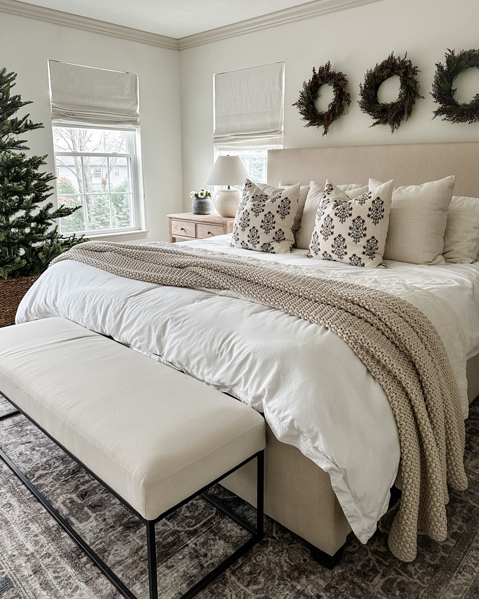 I love adding a few festive touches to every room, including my bedroom. The glow from the tree lights is extra cozy in here. 

#LTKHoliday #LTKHome #LTKSeasonal