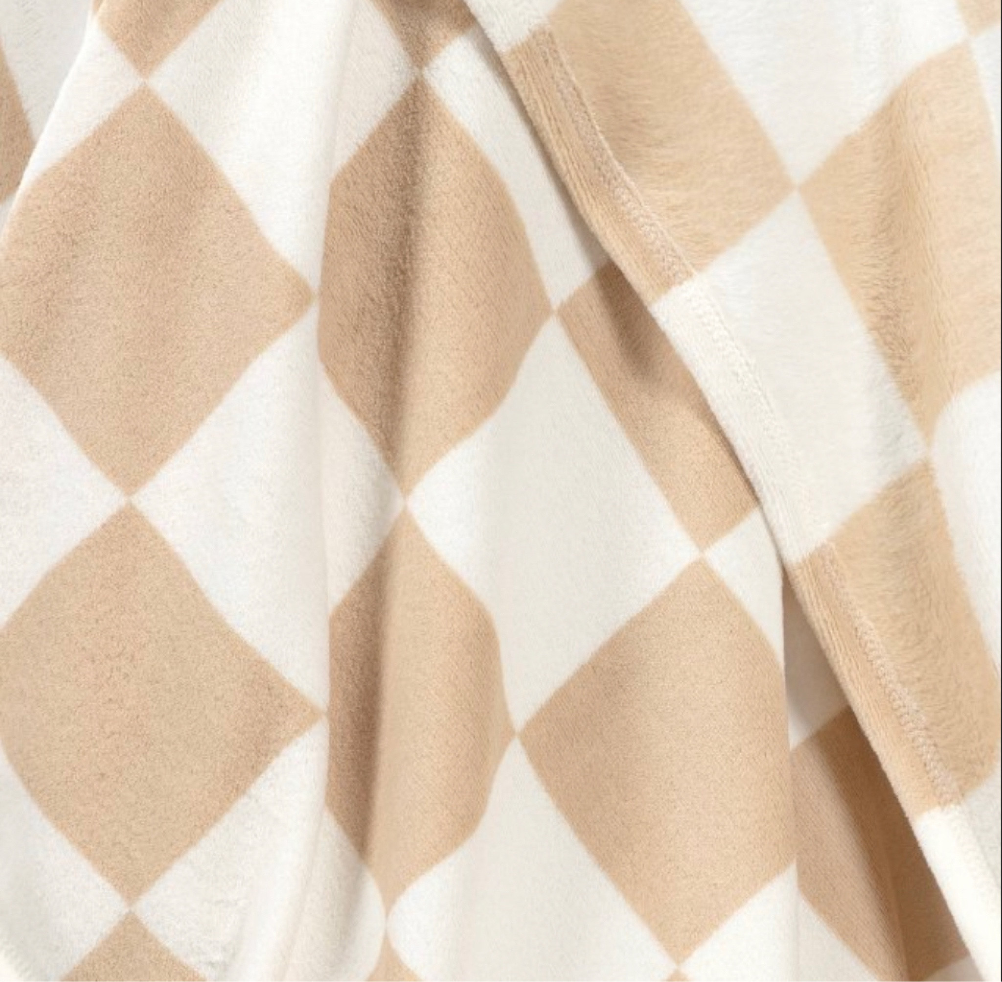 My favorite plush checkerboard blanket for $10!

#LTKfindsunder50 #LTKSeasonal #LTKhome