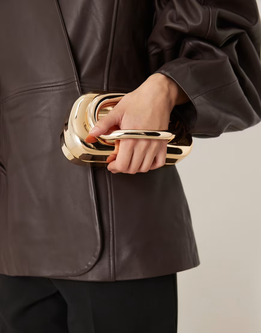 True Decadence hard clutch bag with handle detail in gold | ASOS (Global)