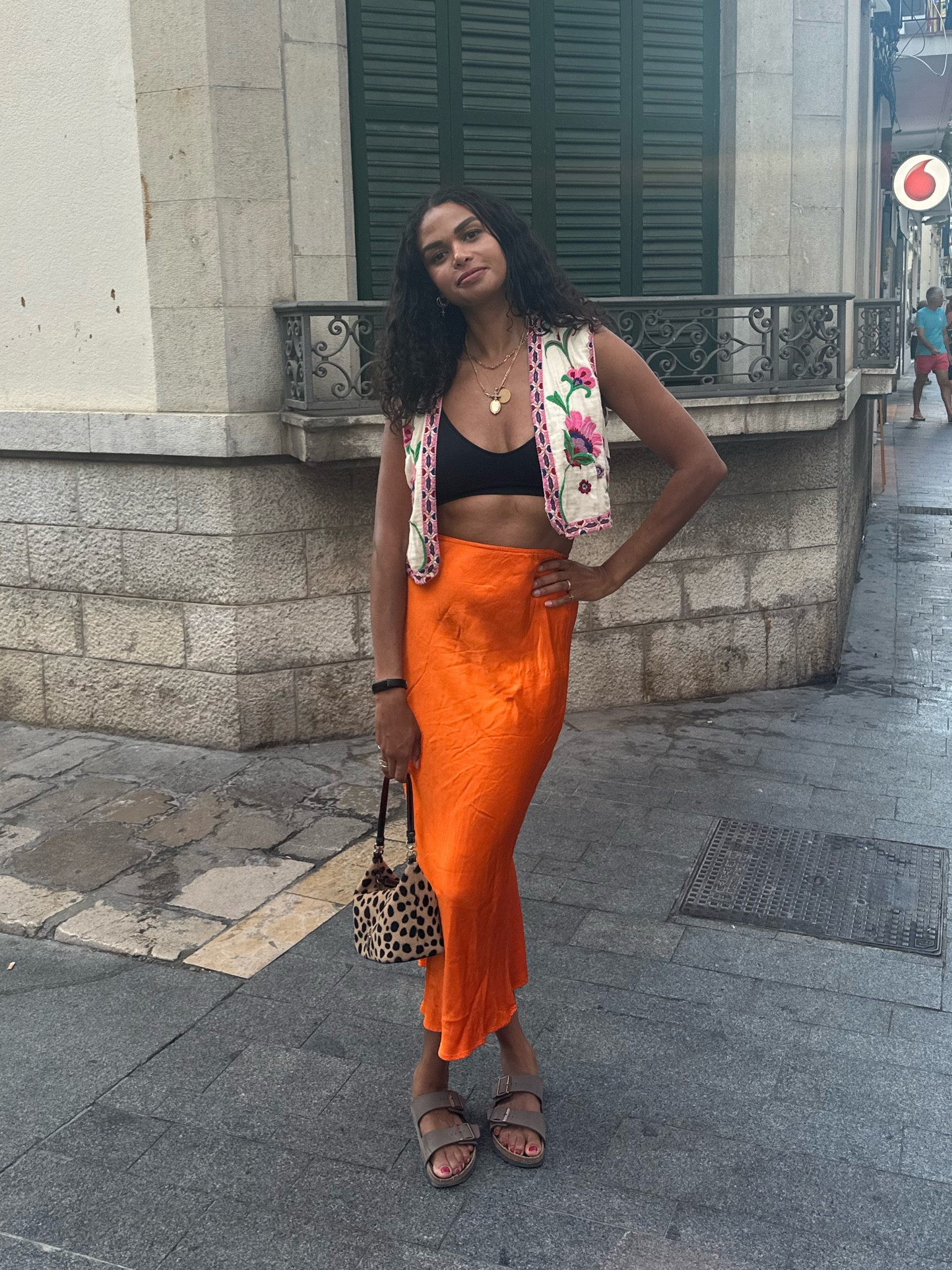 Bohemian outfit, colourful outfit, satin modi’s skirt, floral details, embroidered waistcoat, bralette top, Birkenstocks, holiday outfits, pink and orange, crop top, leopard print

#LTKstyletip #LTKHoliday #LTKfindsunder50