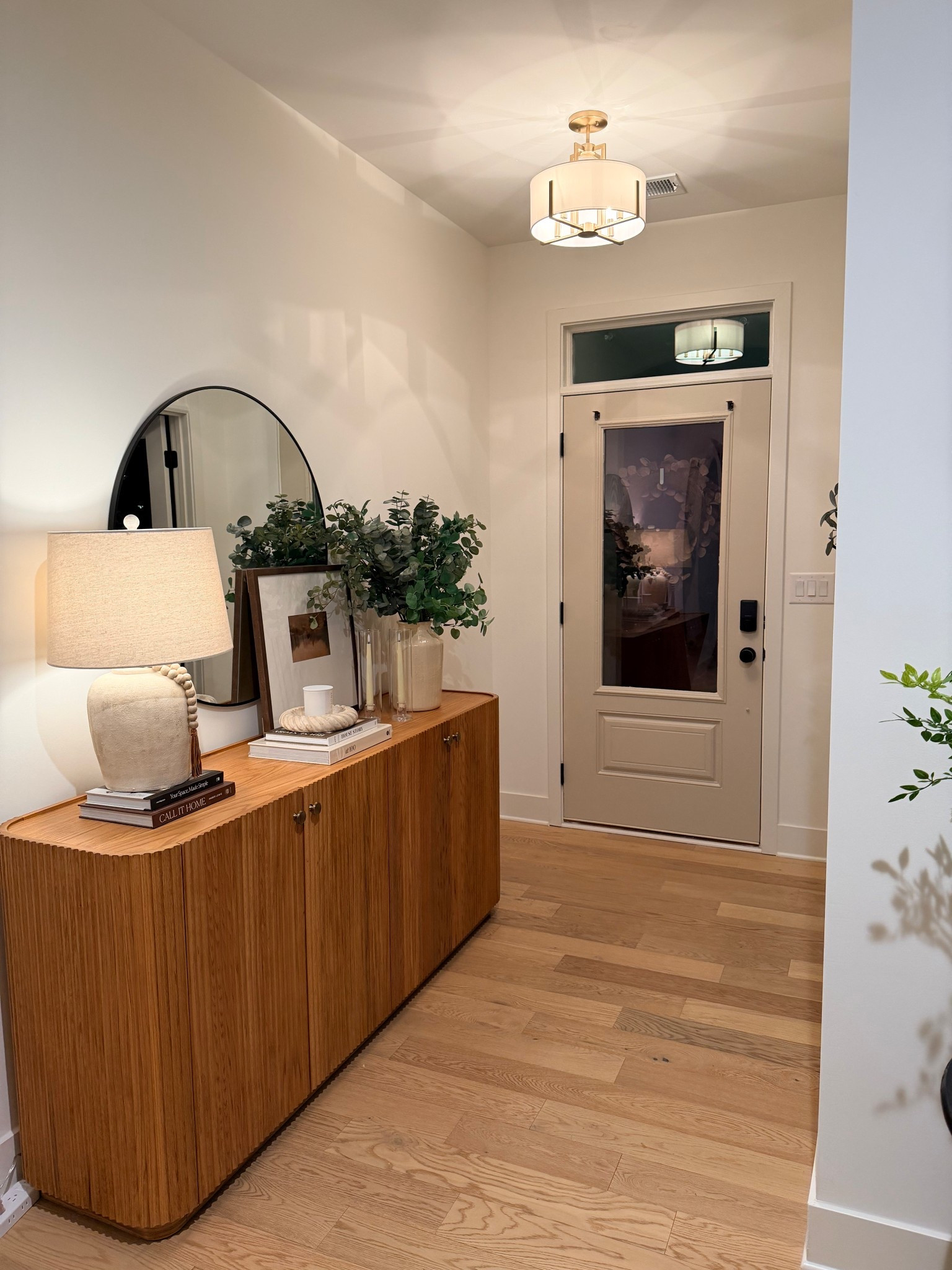 Sometimes new beginnings is just what you need. Loving my foyer refresh. This Skirma Sideboard is just what it needed. Plus painting the back of my front door accessible beige was chefs kiss. 

#LTKHome #LTKgrwm #LTKOver40