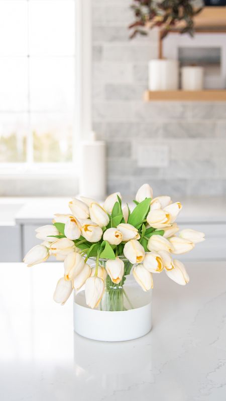 Beautiful artificial tulips and glass vase for your spring home decor. Coastal style home decor.

#LTKfamily #LTKhome