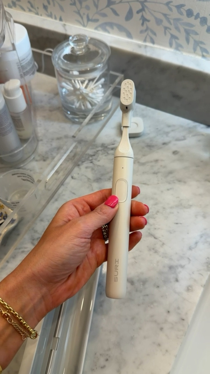 So random but I’ve been looking high and wide for a plastic free electric toothbrush and found this one from @discoversuri and I LOVE it. Love the sleek design, it cleans so well, it has a one month battery life and it comes with this really cool travel case that sanitizes your toothbrush with a UV light. I’m buying Cam one now 😂

#LTKselfcare #LTKmorningroutine