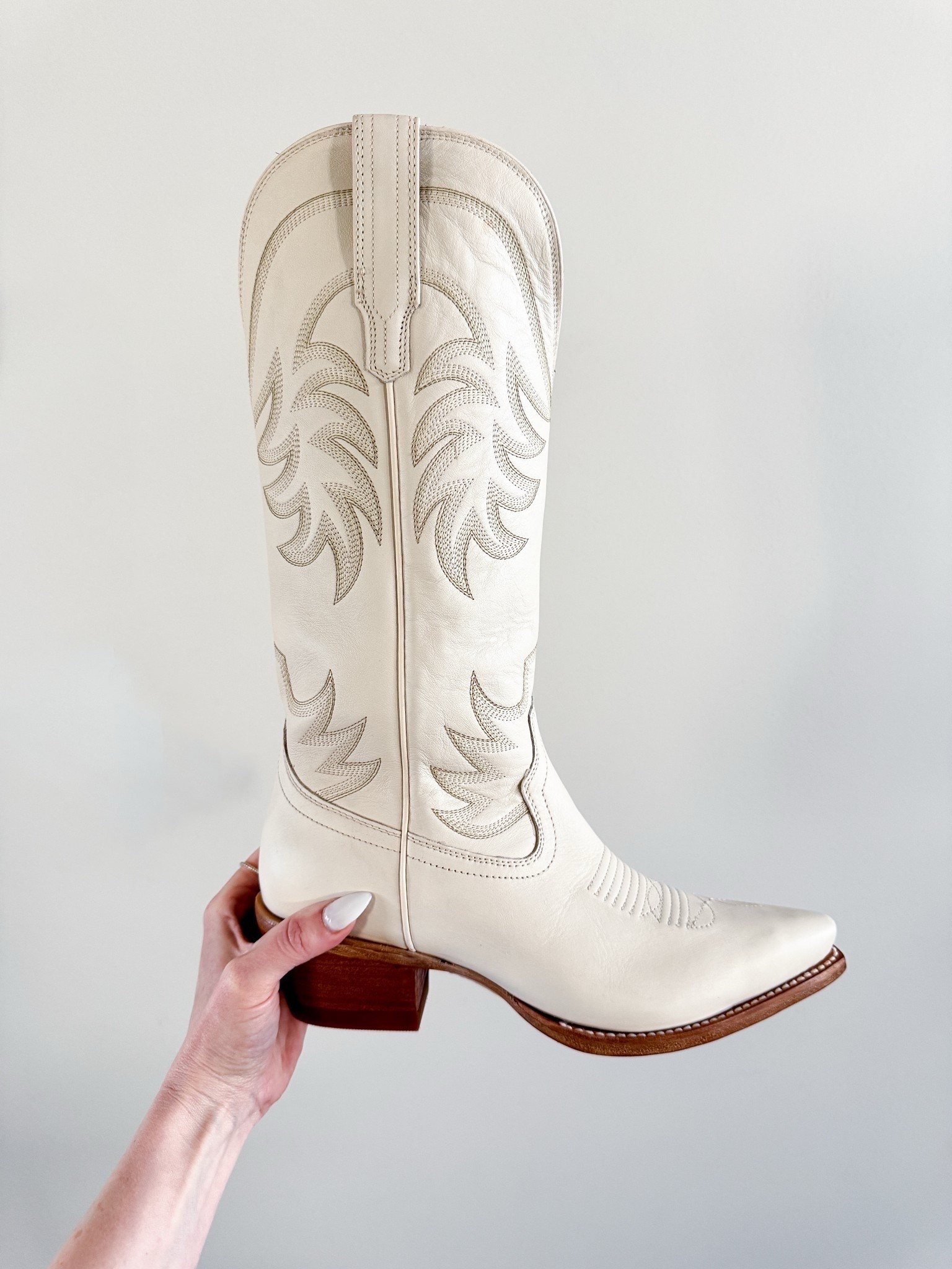My forever go-to cowboy boots, The Annie by Tecovas. Tall, timeless, & beautifully made. The 14-inch shaft has the prettiest tonal stitching + that deep scallop that looks flattering on every leg. The snip toe gives them a modern, clean edge while the signature toe stitching keeps them classic. They break in perfectly & age even better. If you’re gifting quality, these are the ones that get a real reaction. They go with everything from denim to dresses.

cowboy boots gift idea – Tecovas Annie boots – western boots women – neutral cowboy boots – white western boots – holiday gift ideas for her – best boots for women – classic cowboy boots – tall western boots – winter outfit ideas – capsule wardrobe boots – everyday western style – snip toe boots – leather cowgirl boots – Tecovas boots for women – luxury gift ideas – timeless wardrobe staples

#LTKGiftGuide #LTKU #LTKmomlife