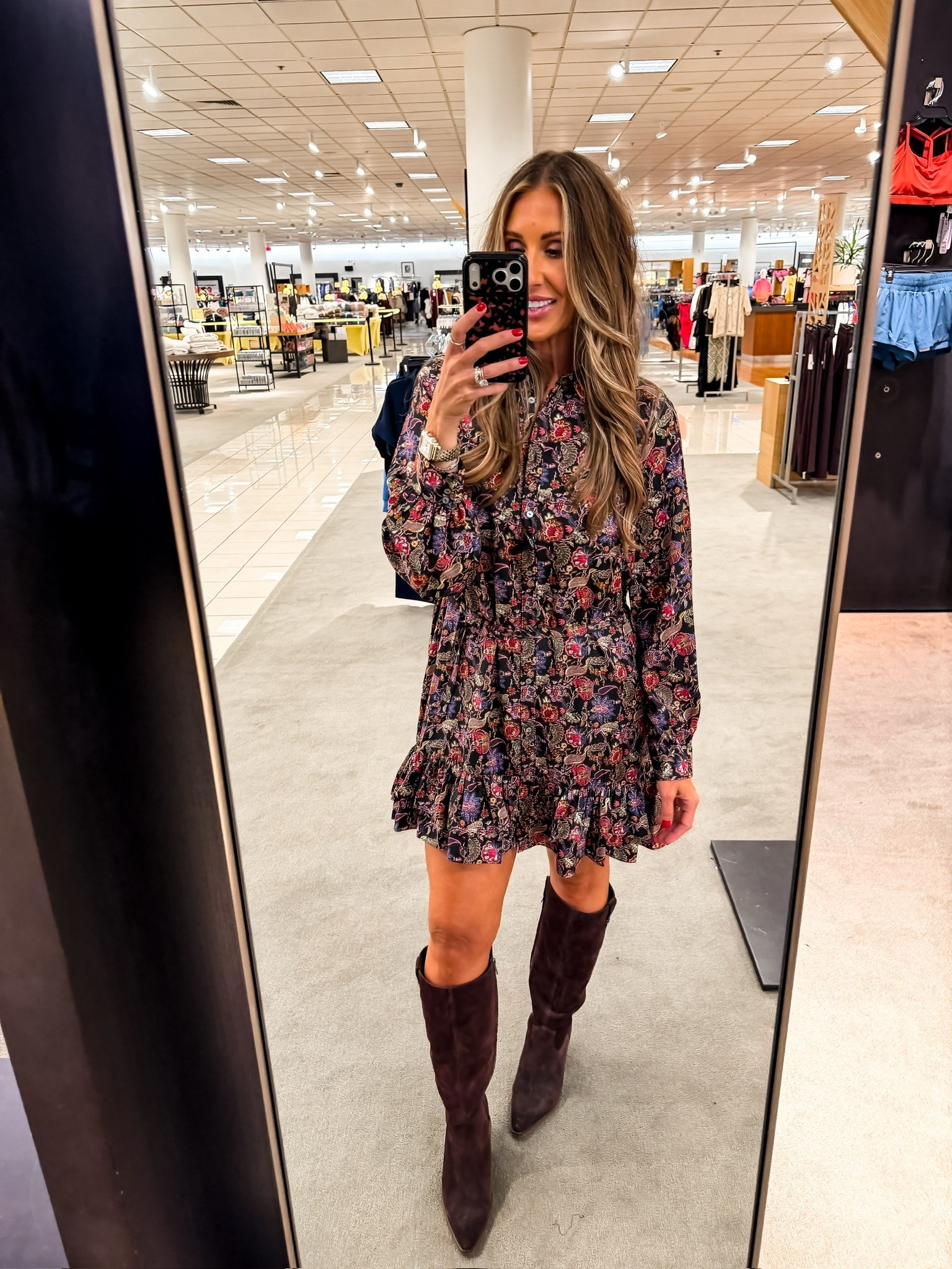 I bought last year’s version of this dress, so I was curious to see what they changed. The updated high low hem gives it more movement and shows off tall boots beautifully, while the darker floral print feels perfect for fall. It is a bit of a splurge, and I sized up from my usual 8 to a 10 for a more comfortable fit through the shoulders and chest.

floral fall dress, high low hem dress, fall mini dress, tall boots outfit, long sleeve dress, fall event outfit, splurge worthy dress, size 10 dress, over 40 fall style, themominstyle

#LTKootd #LTKOver40 #LTKSeasonal