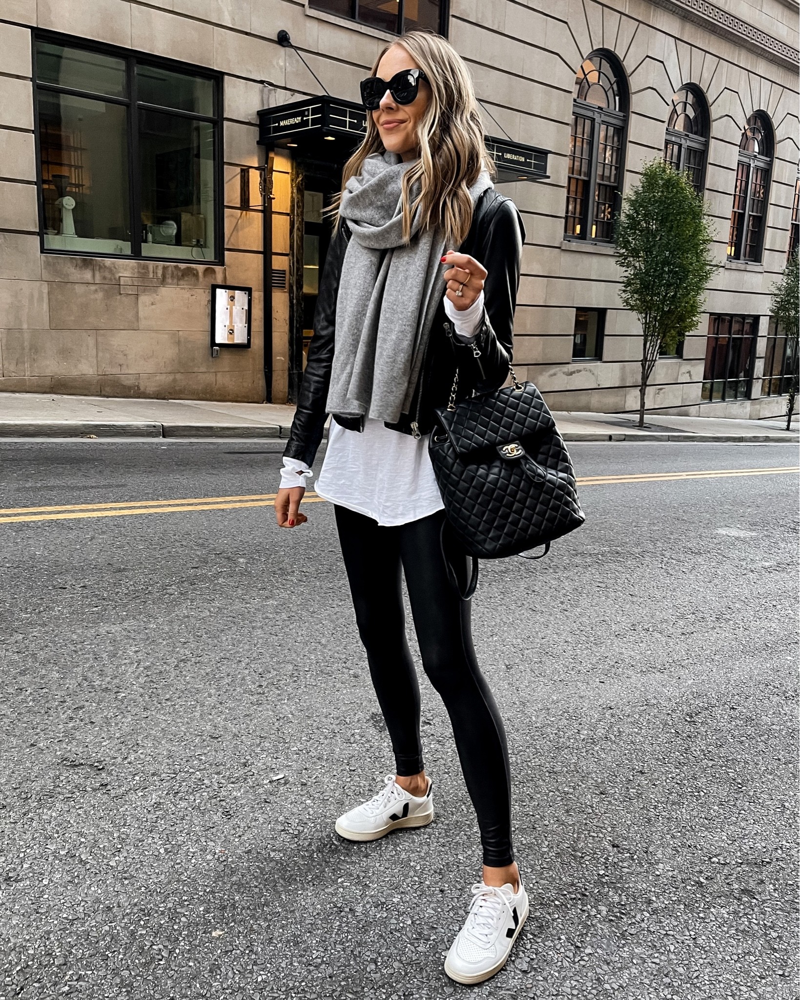Fashion Jackson wearing black leather jacket (small) Spanx faux leather leggings, veja sneakers, grey scarf, Chanel backpack #falloutfit #sneakers 

#LTKstyletip #LTKSeasonal #LTKunder100
