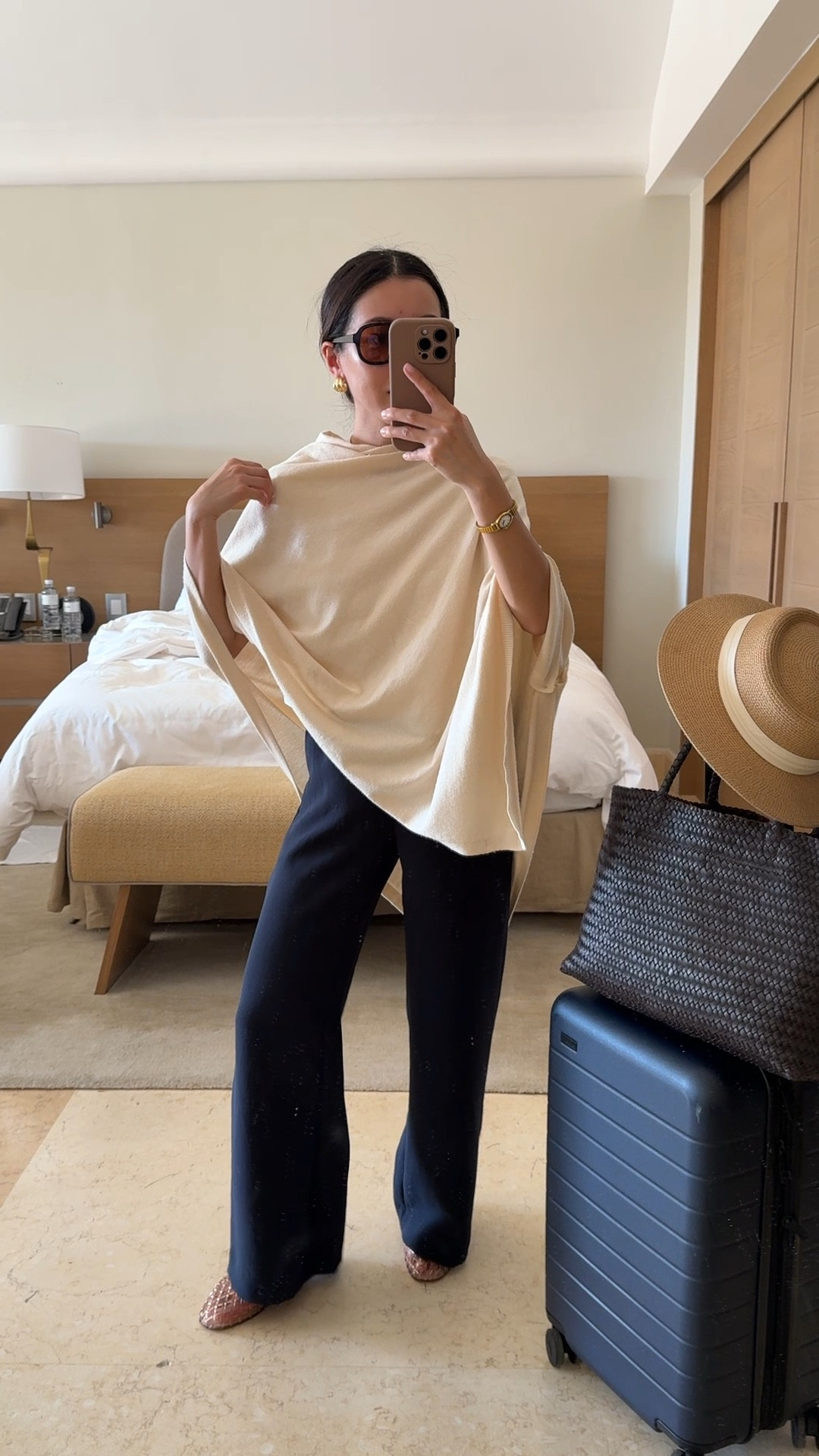 Travel outfit ootd

• Aritzia lodge trousers 2XS short, these are amazing! Drapey fluid fabric that isn’t thin, stretch waist, wrinkle resistant

• Amazon convertible poncho sweater wrap

• lululemon cropped boxy cut t-shirt size xxxs (could also do XXS) nice medium-weight breathable cotton, softly structured and perfect petite friendly length

• Dolce Vita jelly flats in Mocha size 5, size down if you're a half size

• Madewell woven leather tote - My favorite work / mom / travel bag that fits my laptop and much more

• Madewell aviator sunglasses

• Amazon packable sunhat with an adjustable inner fit. I’ve owned this for years 

• Away the bigger flex carry-on suitcase, lightweight, roomy size and durable. I've traveled a lot with this.

Petite friendly travel outfit, family vacation, spring break, easy mom outfit

#LTKmomlife #LTKTravel #LTKPetite