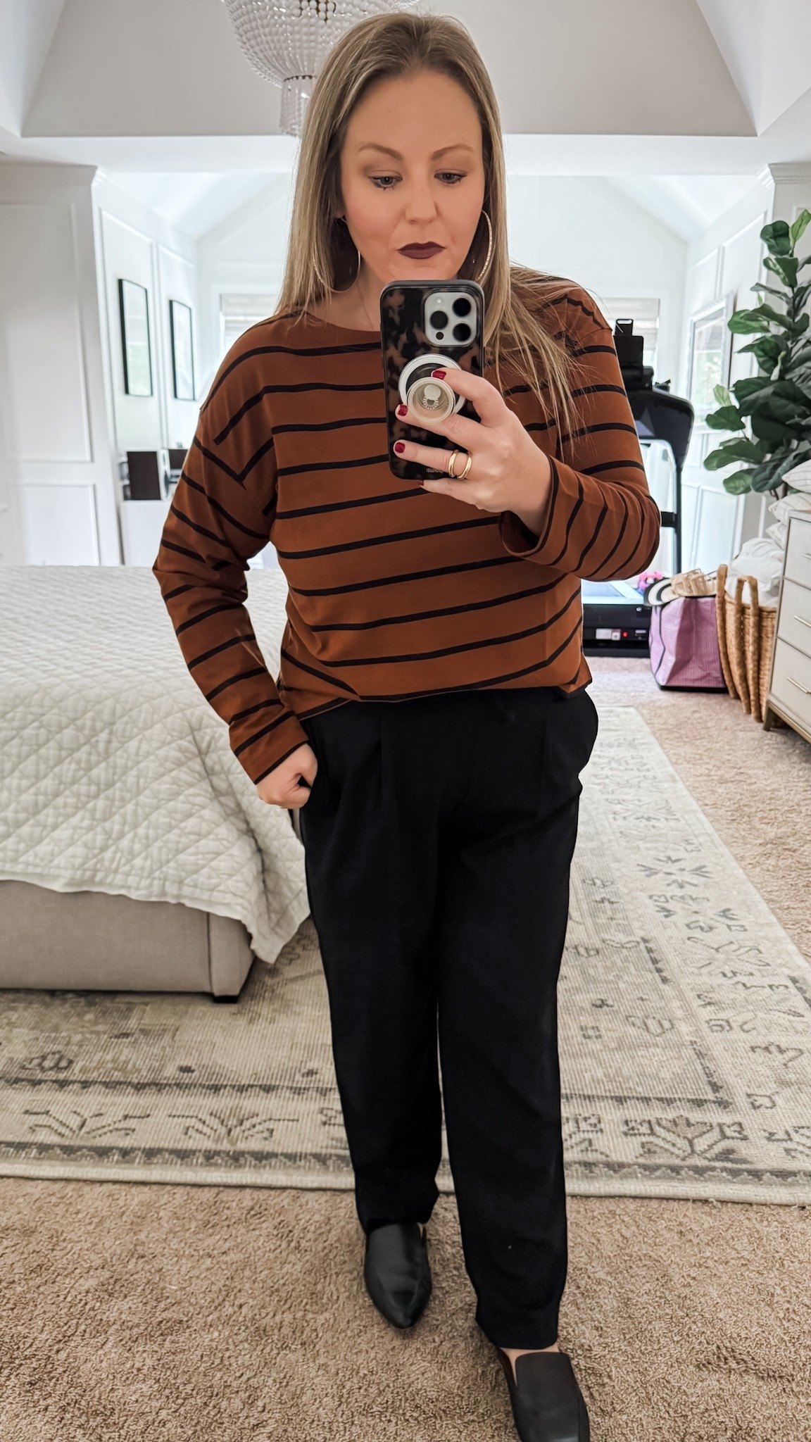 I love the shorter length of these straight leg black trousers and they’ll never go out of style. They pair perfectly with these brown striped shirt that’s available in lots of different colors, and they’re both currently on BOGO free sale! work outfit fall outfit black pants date night outfit 

#LTKSaleAlert #LTKFindsUnder50 #LTKWorkwear