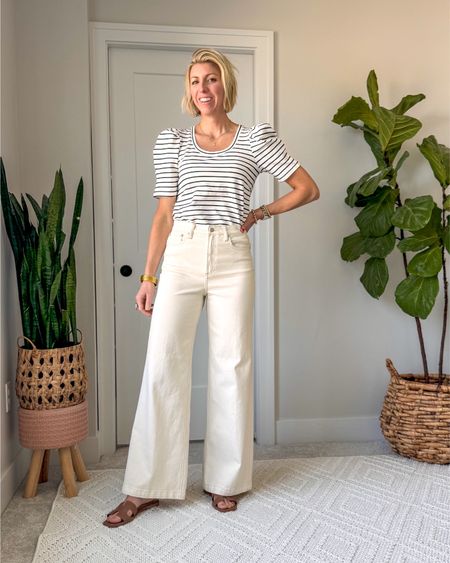 Off-white full length wide lake jeans are so chic for spring and summer! These have amazing stretch, but I always recommend going up a size in white jeans for a relaxed and flattering look. I am wearing a size 28.

#LTKVideo #LTKstyletip #LTKover40
