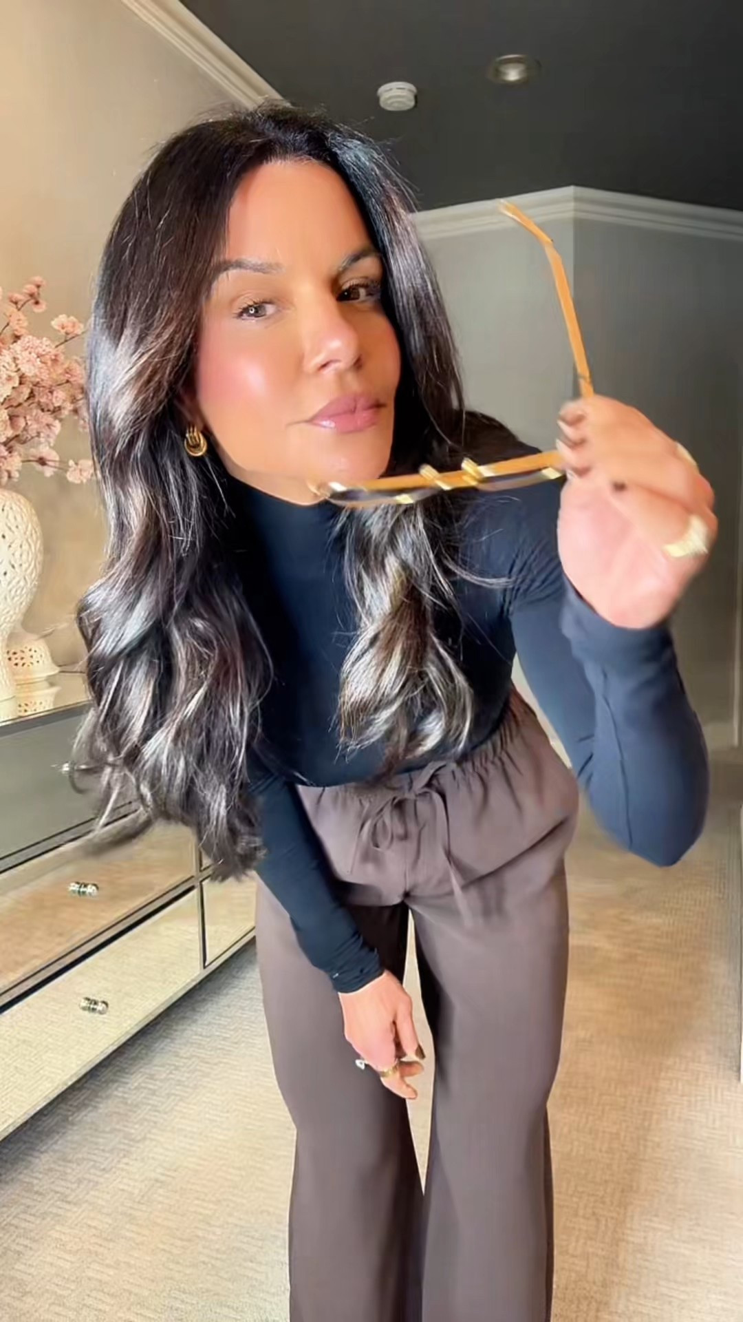 Started with basics. Added one thing. Not so basic anymore.
That's the move.

Bodysuit OS
Pants 4
Coat Small

#LTKOver40