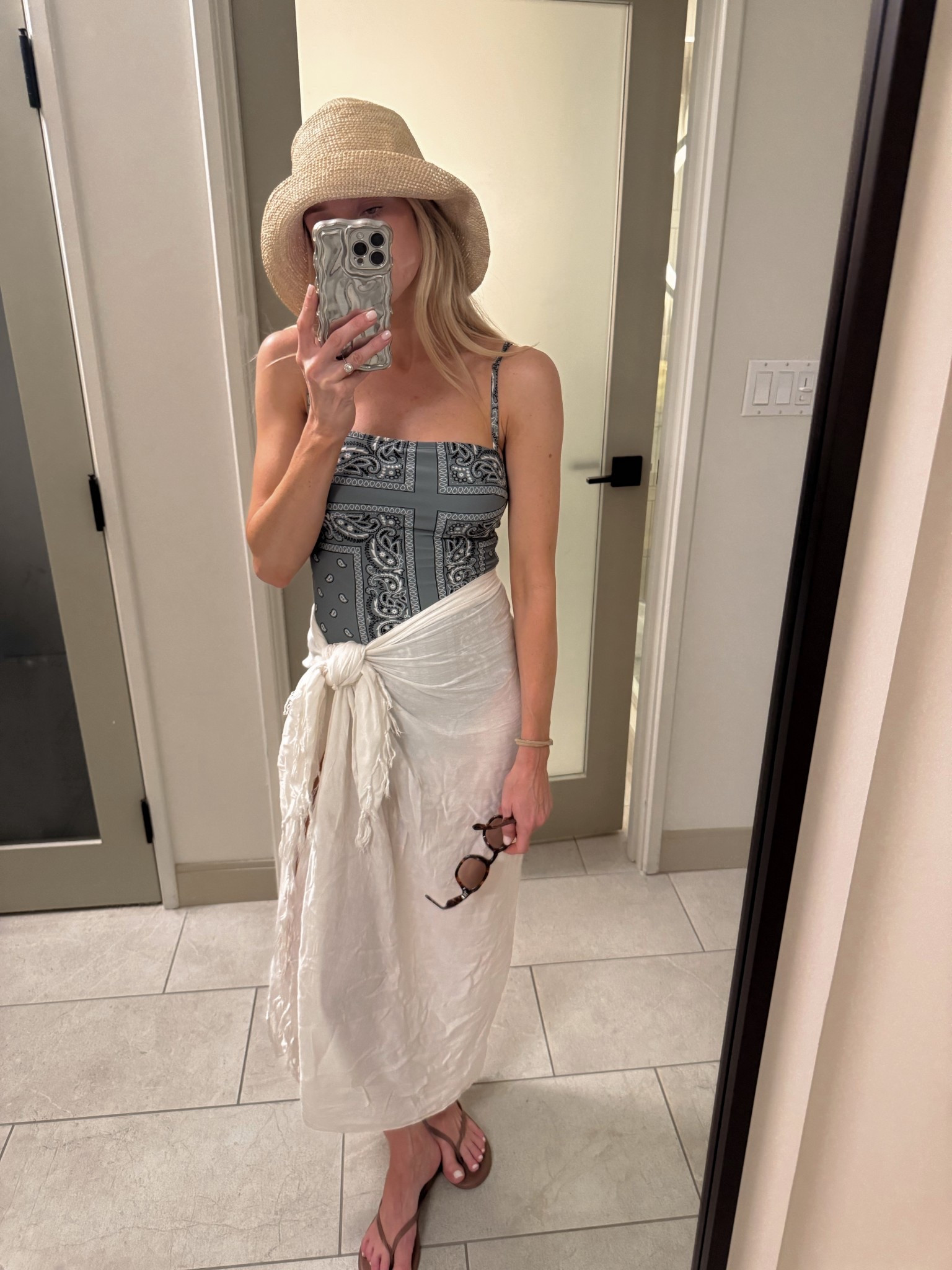 One piece Swimsuit under $50! - runs true to size
Straw bucket hat 

Beach / swimwear / sarong / sun hat 