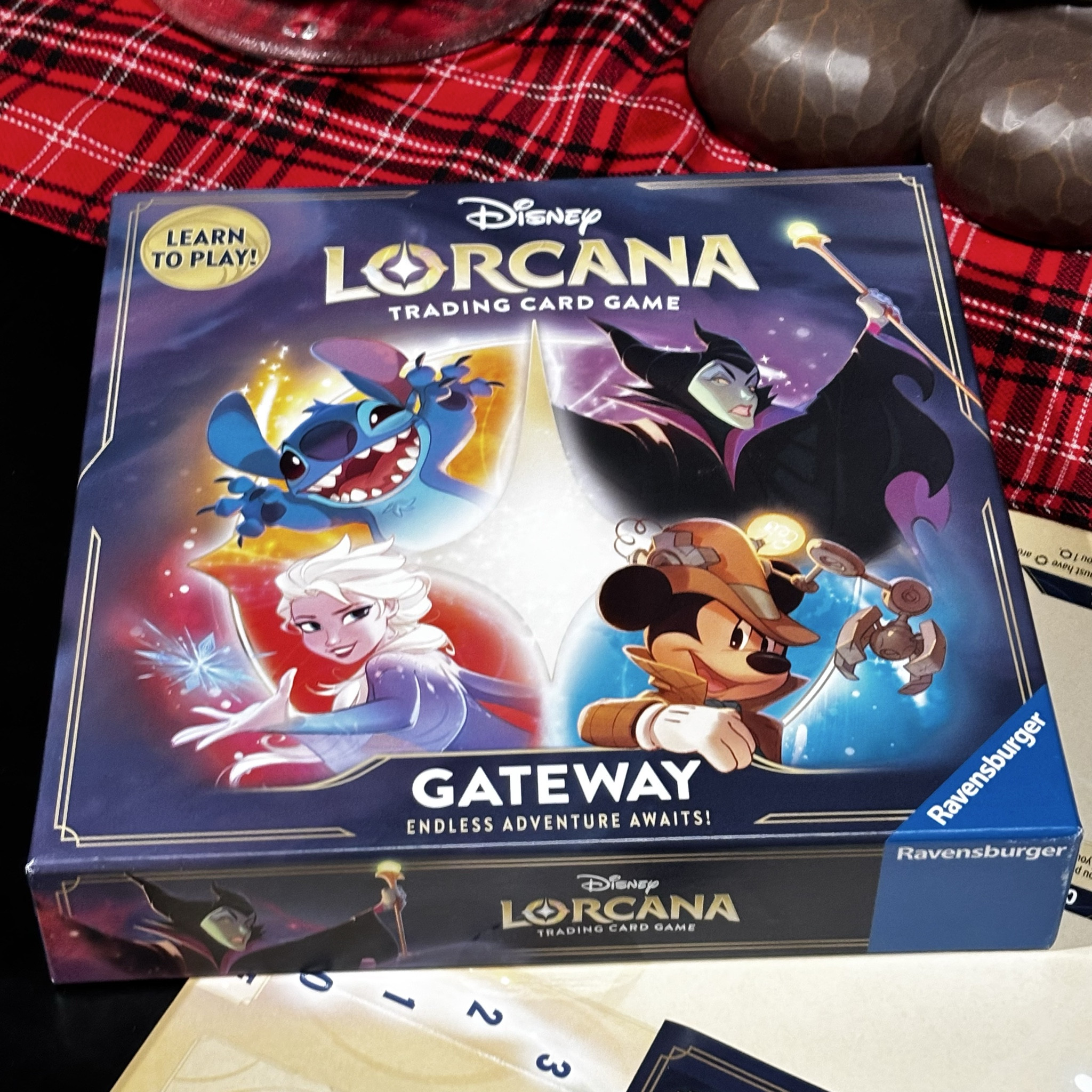 We are obsessed with Lorcana! We have already purchased more cards! So fun! Ready to dive into Disney Lorcana? The Gateway box is the perfect way to learn this magical new trading card game! Whether you’re brand new or introducing it to friends and family, this set has everything you need to start your Lorcana adventure. Featuring iconic characters like Mickey, Elsa, Stitch, and Maleficent this game is fun, strategic, and full of Disney magic. 
#DisneyLorcana #TradingCardGame #DisneyGames #LTKGiftGuide #LorcanaGateway #FamilyGameNight #CardGameForBeginners
#disney #cardgame #cardtrading #lorcana

#LTKFamily #LTKSaleAlert #LTKFindsUnder50