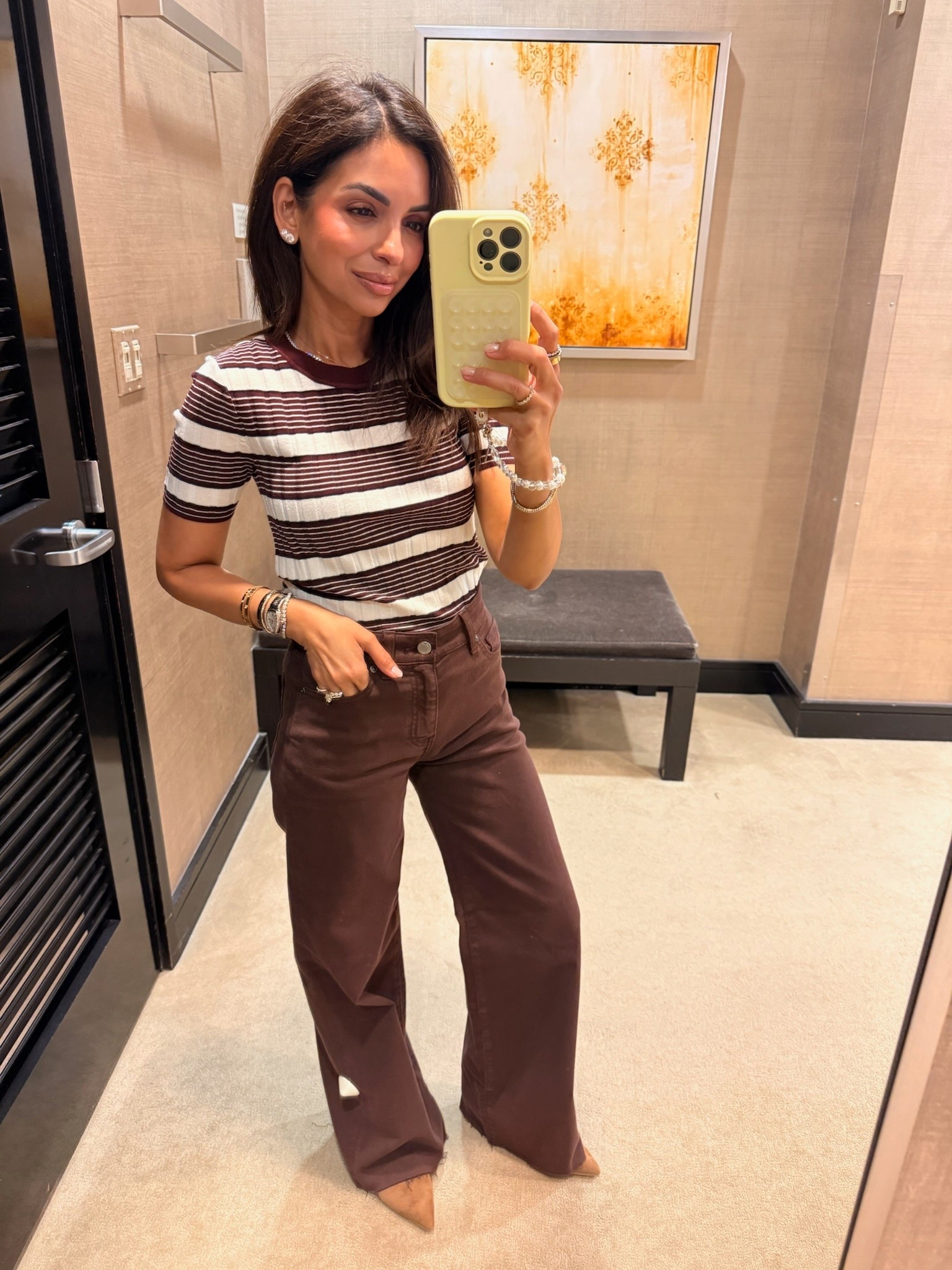 These Paige jeans are a little long for me in the regular length, so would be perfect to pair with booties or a heel! I’m an XS in the shirt and a 24 in the jeans.