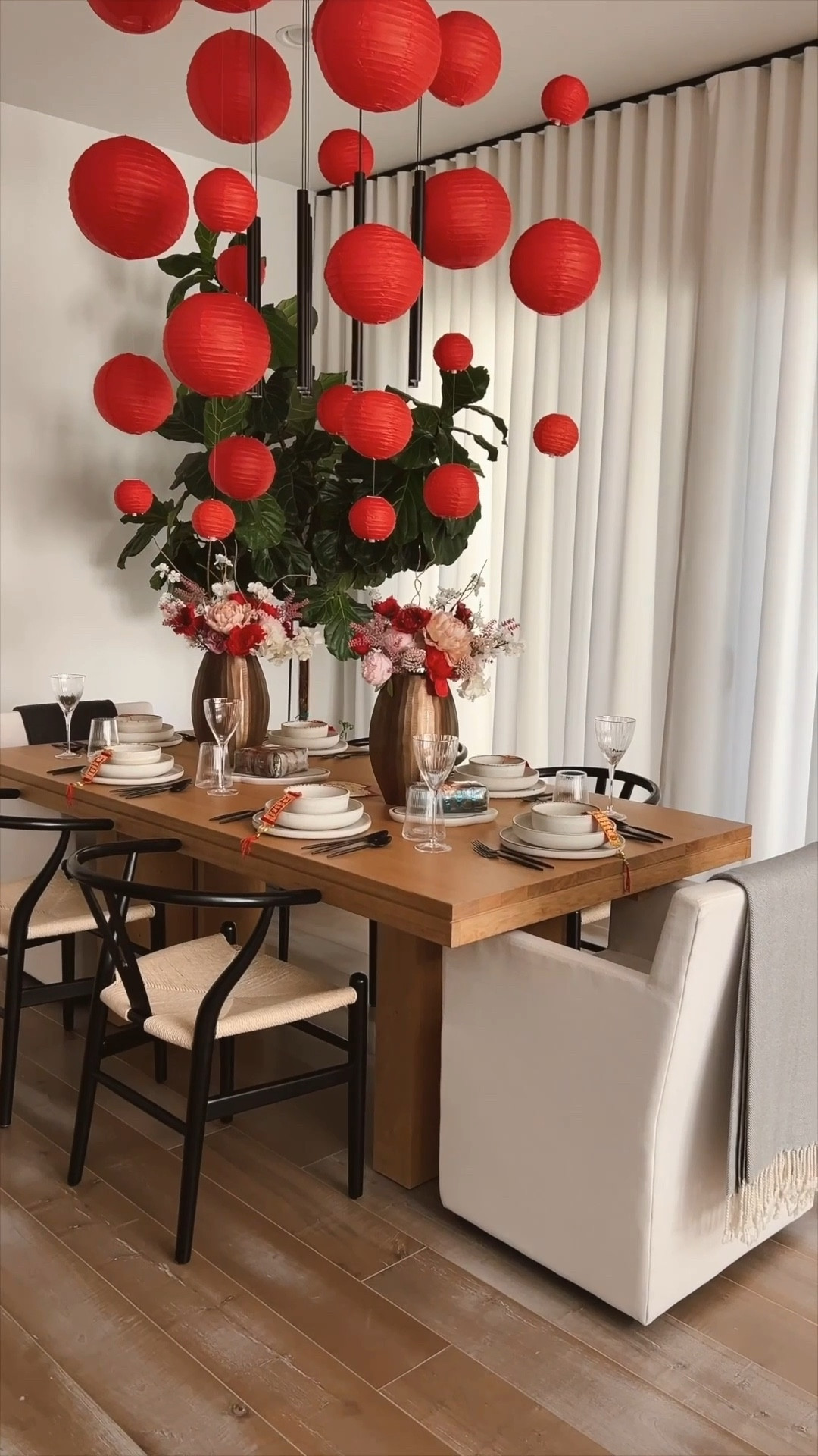 Lunar New Year decor for our dining room! Love these red paper lanterns and I hung them with clear fishing wire and command hooks. Set our table with Arhaus dinner plate, salad bowls and cereal bowls. 

#LTKSeasonal #LTKHome
