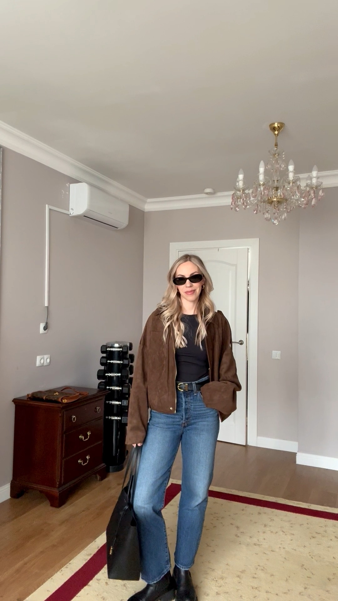 Casual spring outfit, @Levi's ribcage ankle jeans on sale, @Zara faux suede bomber jacket, YSL tote bag, black and brown outfit idea 

#LTKSaleAlert #LTKSpringSale #LTKOver40