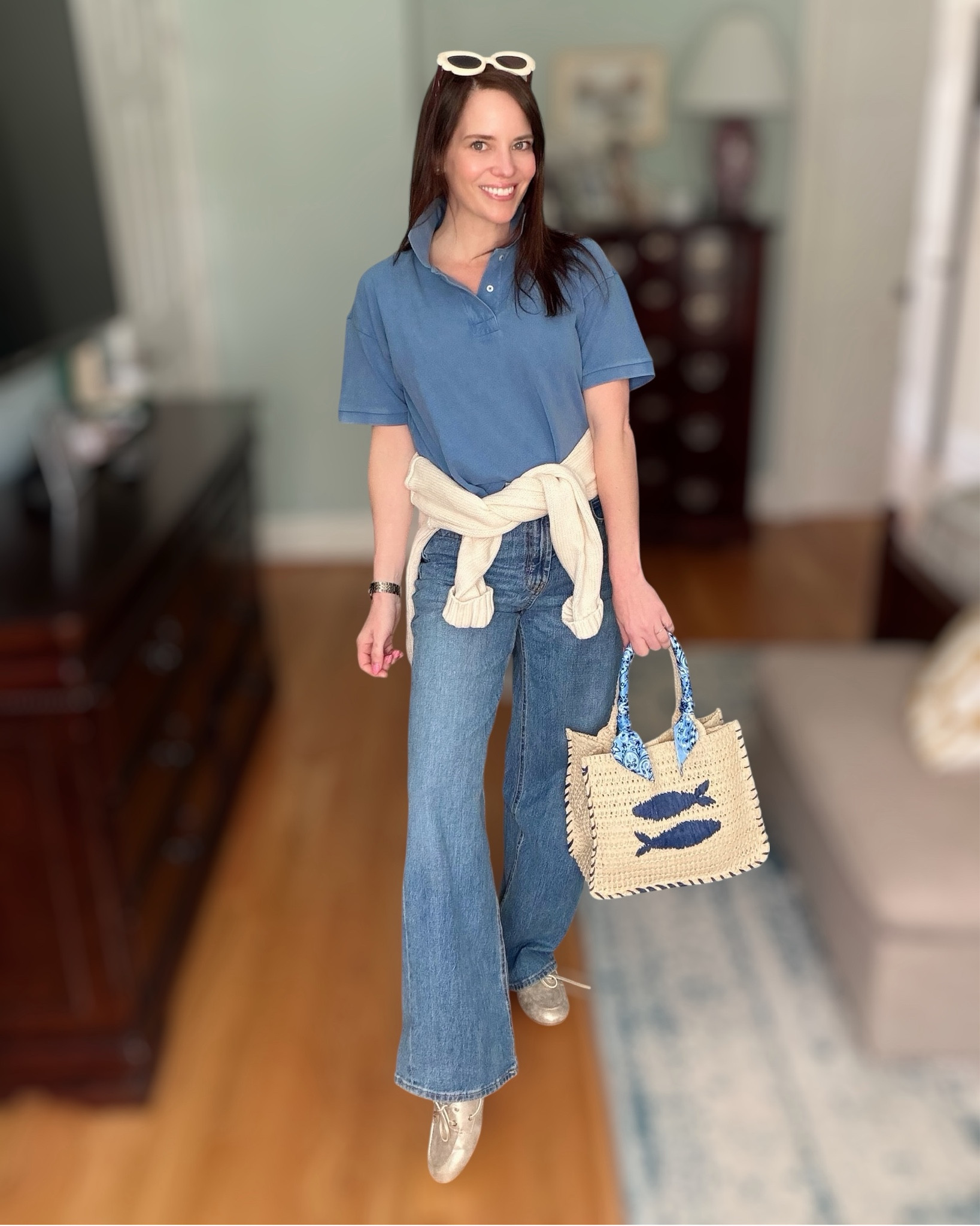 Preppy Blue Polo & Wide-Leg Jeans Outfit


An easy preppy casual look for everyday style! 💙 This washed blue polo pairs perfectly with high-waisted wide-leg jeans for a relaxed but polished outfit. I added classic boat shoes, oversized cream sunglasses, and a straw tote with blue fish detailing for a coastal-inspired touch. The Americana sweater draped over the shoulders adds the perfect layer and a subtle patriotic vibe. This is such a great outfit for spring days, errands, casual lunches, or weekend outings. ⚓️

preppy casual outfit, blue polo outfit, wide leg jeans outfit, coastal preppy style, spring casual outfit, Americana sweater outfit, boat shoes outfit, straw tote outfit, classic preppy fashion, everyday spring outfit 💙⚓️

#LTKOver40 #LTKootd #LTKSpringSale