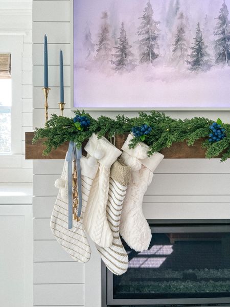 Coastal Christmas mantle! The perfect dusty blue candles and velvet ribbon from cailini coastal. 

McGee and co garland, coastal Christmas, velvet ribbon, blueberry picks, twinkle lights, frame tv, frame tv art

#LTKhome #LTKHoliday #LTKSeasonal