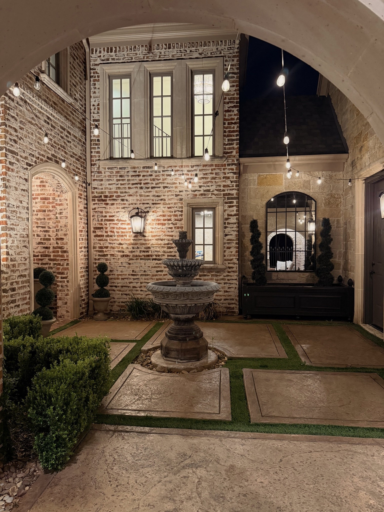 Taking a moment to enjoy the quiet courtyard after a long day. Almost every shrub out here is faux! Linking my favorites.

#LTKHome #LTKSeasonal