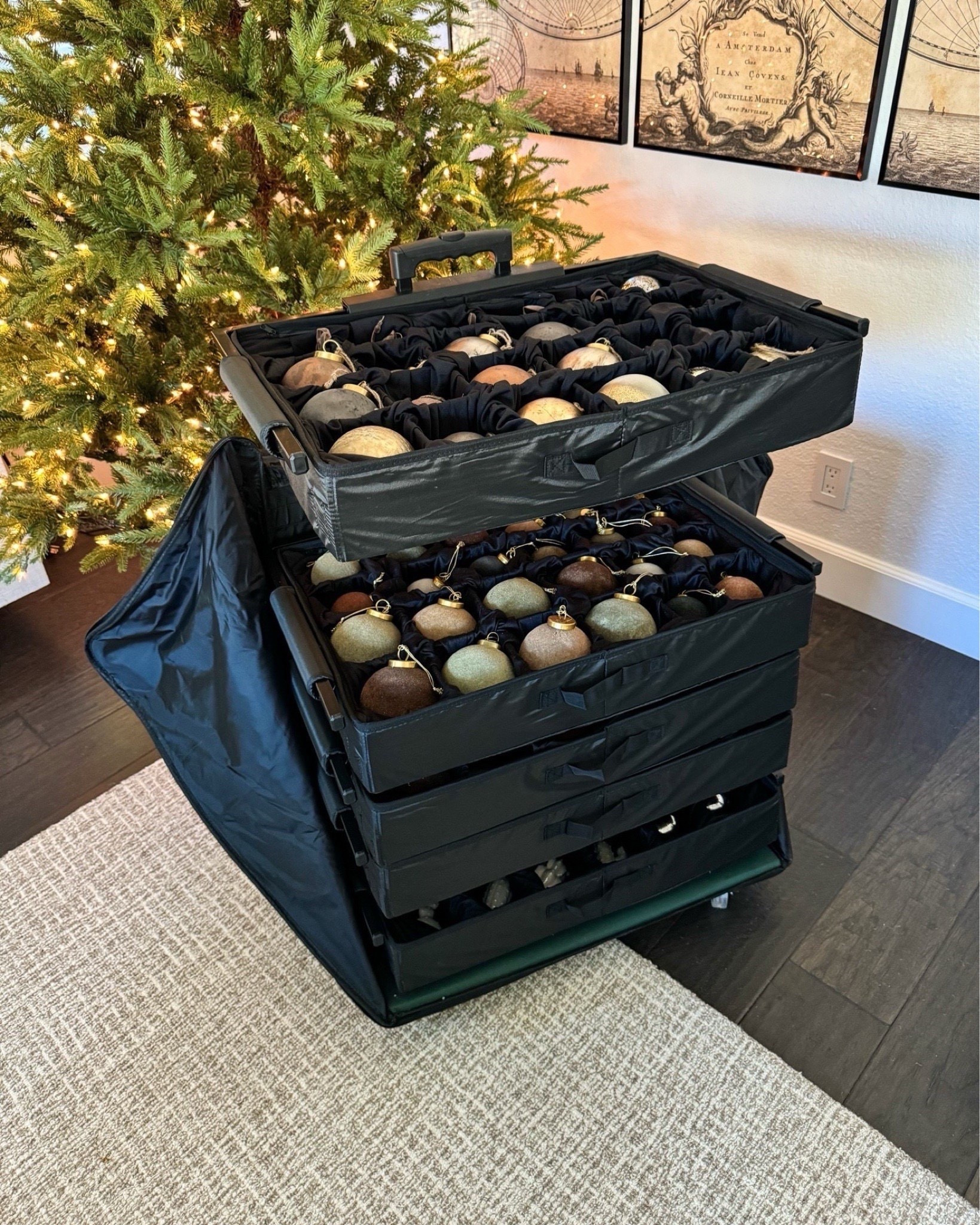 In stock and the lowest price I’ve seen! This viral ornament storage box makes decorating and undercoating your tree easier. Save time from having to unwrap each individual ornament and rewrap at the end. The handle telescopes to a height much easy for your back and the shelves can be easily moved from one spot to another or taken into a different room. You can adjust the space thin each shelf for different size ornaments.
Zips up and wheels away for easy storage 

#LTKHome #LTKSeasonal #LTKHoliday